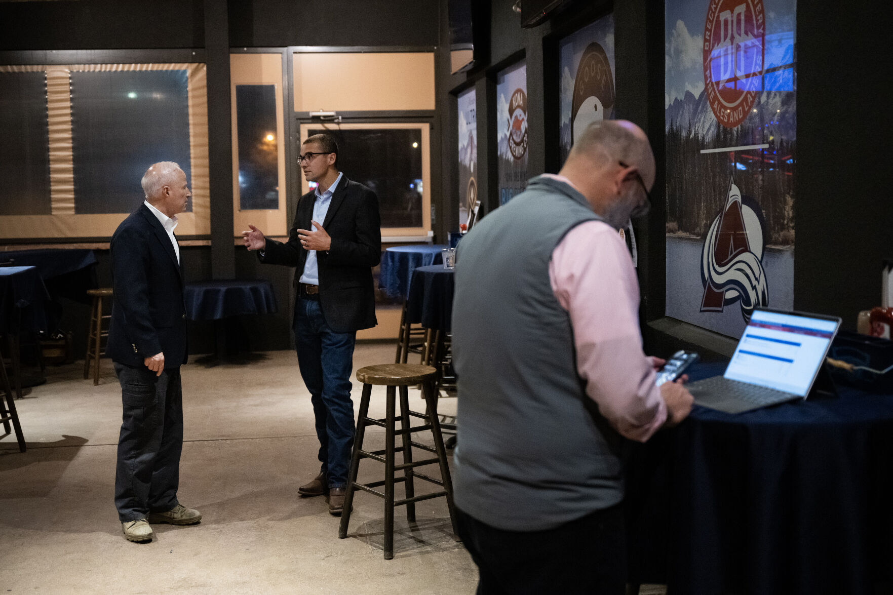 Aurora Mayor Mike Coffman, left, talks with President of the Advance Colorado Institute Michael Fields while Coffman’s campaign manager Bill Ray looks at election results during the “No On HH-Advance Colorado election night watch party” on Nov. 7, 2023, at JJ’s Place in Aurora. (TimHursttim.hurst@gazette.comhttps://secure.gravatar.com/avatar/aca82bd62b4ee425c598527cd6faa1b1?d=mm&r=g)