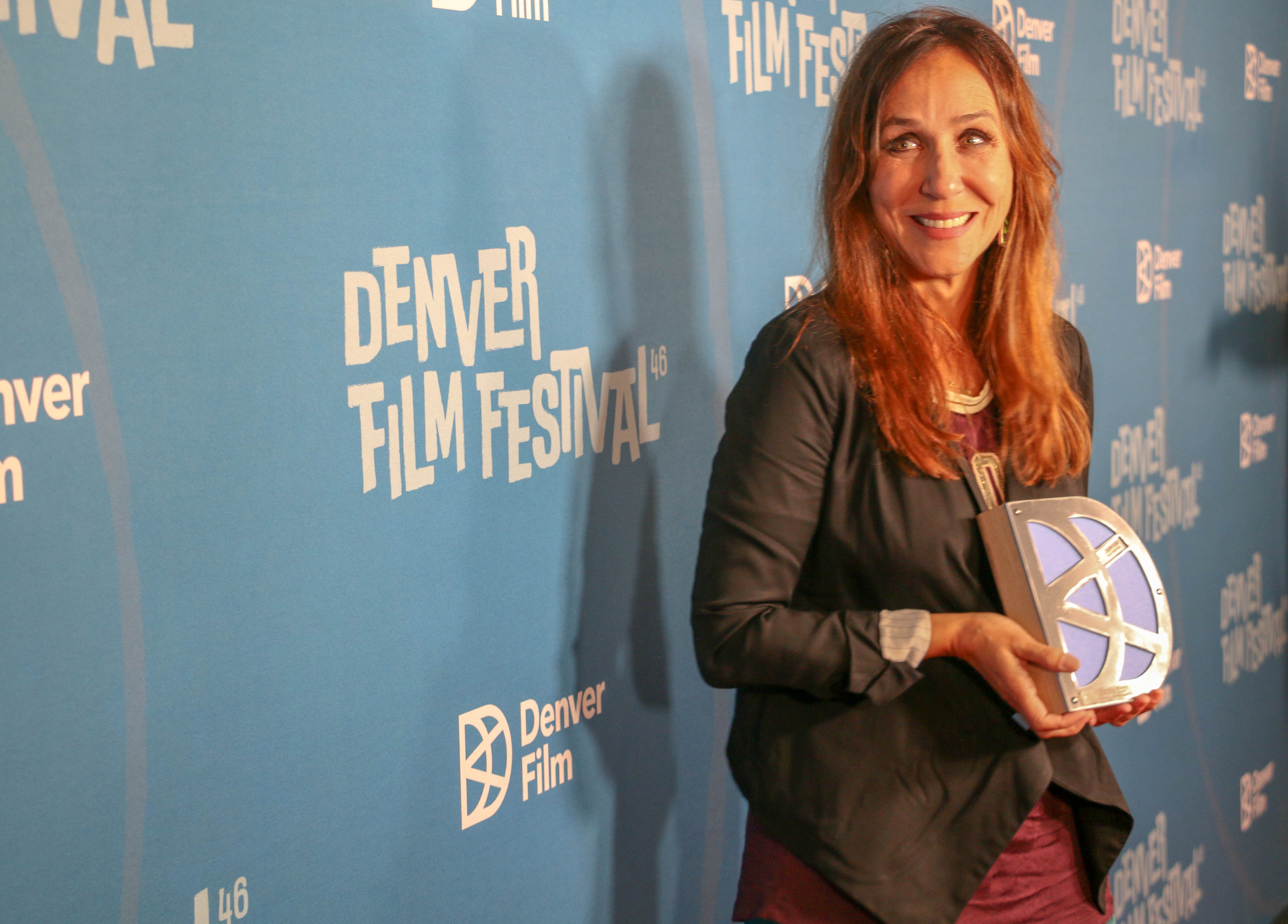 Gabriela Cowperthwaite, a graduate of Colorado Academy, accepts Denver Film's Women+Film Barbara Bridges Inspiration Award on Saturday, Nov. 11, at the Denver Museum of Nature and Science. (JOHN MOORE/DENVER GAZETTE)