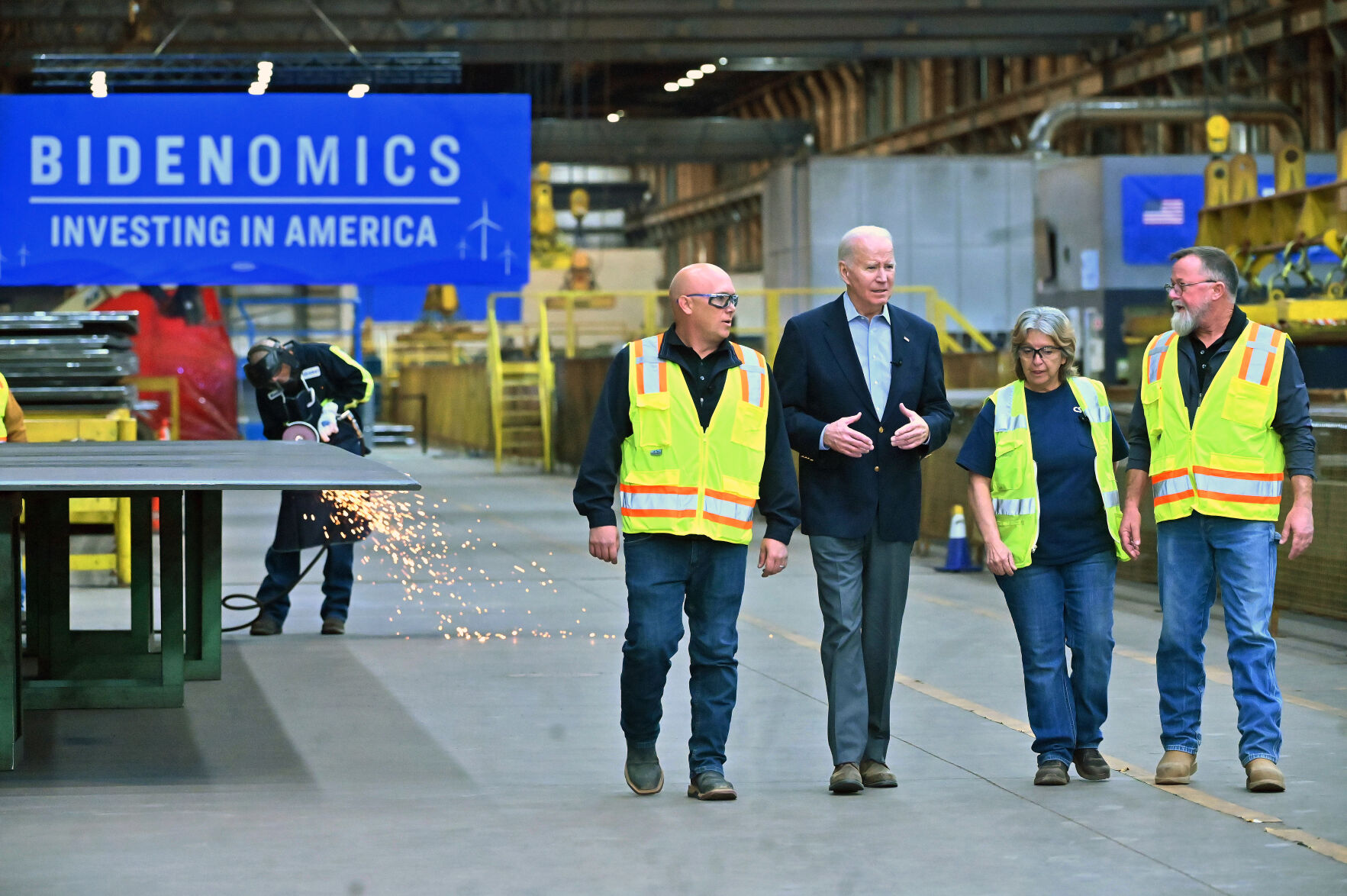Pres. Joe Biden chats with employees at CS Wind in Pueblo while on a tour of the plant on Wednesday, Nov. 29, 2023. CS Wind manufacturers wind turbines. (Photo by Jerilee Bennett, The Gazette)