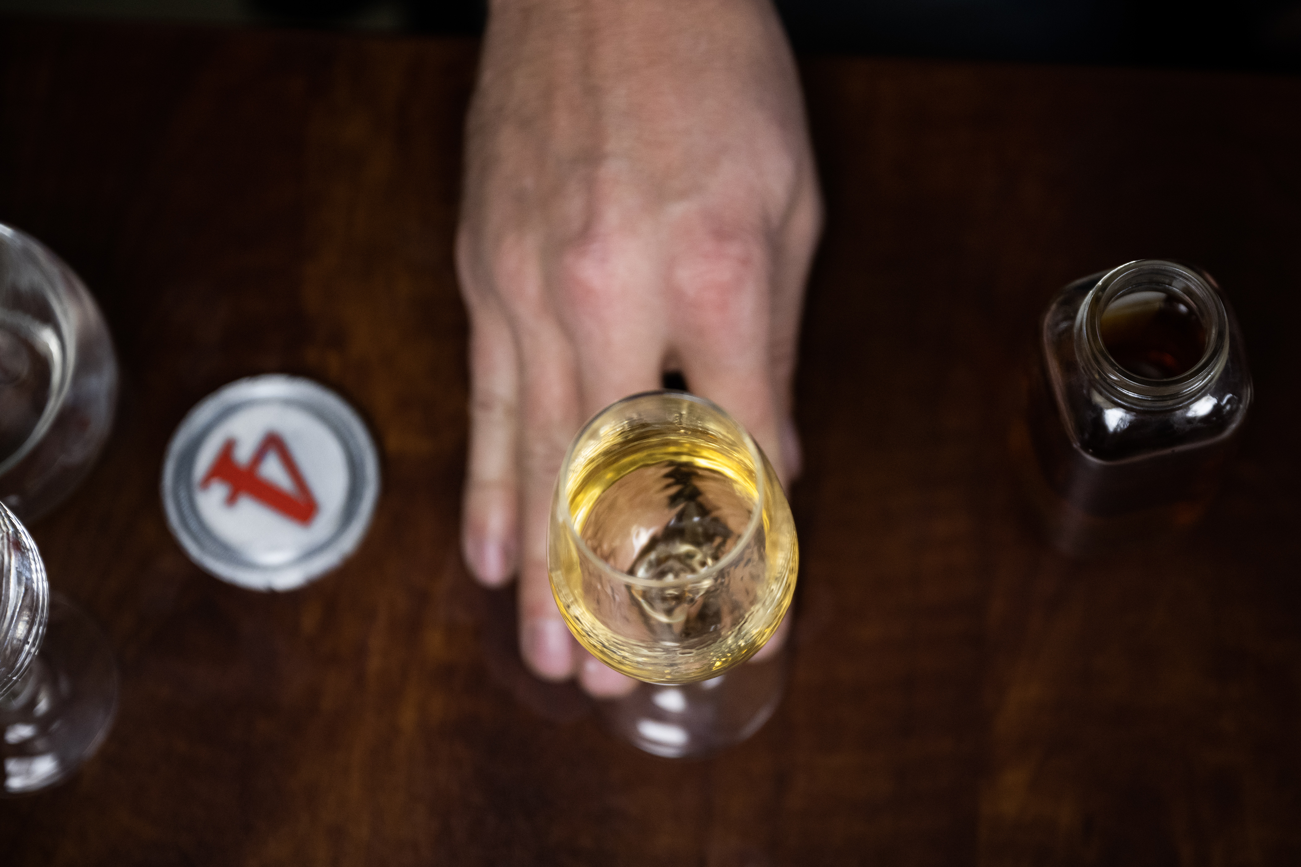 Stranahan's Whiskey Distillery head blender Justin Aden swirls a sample of whiskey in a glass while blending and taking notes in his office on Thursday, Nov. 9, 2023, in Denver, Colo. (Timothy Hurst/Denver Gazette) (TimHursttim.hurst@gazette.comhttps://secure.gravatar.com/avatar/aca82bd62b4ee425c598527cd6faa1b1?d=mm&r=g)