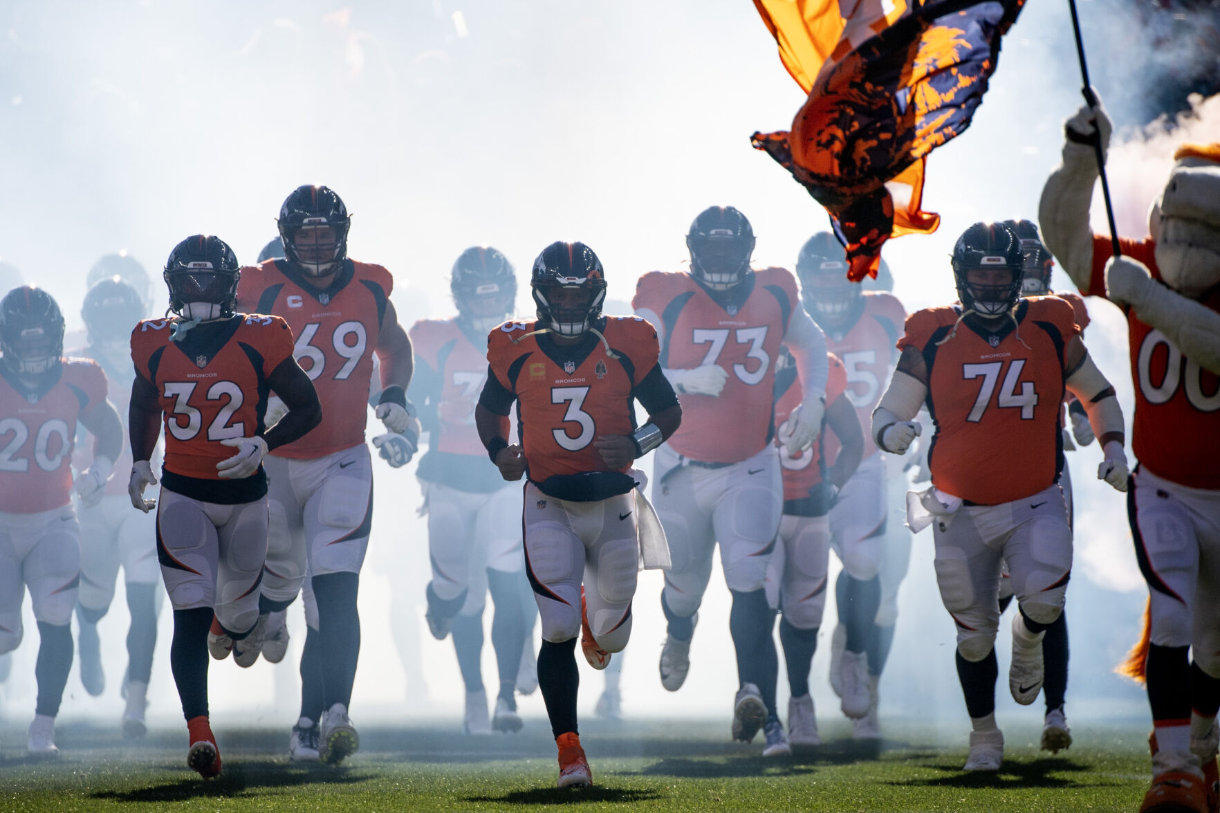 Denver Broncos quarterback Russell Wilson (3) leads the Broncos onto the field at the start of a game agains the Cleveland Browns on Sunday, Nov. 26, 2023, at Empower Field at Mile High in Denver, Colo. (Parker Seibold, The Gazette) (Parker Seibold)