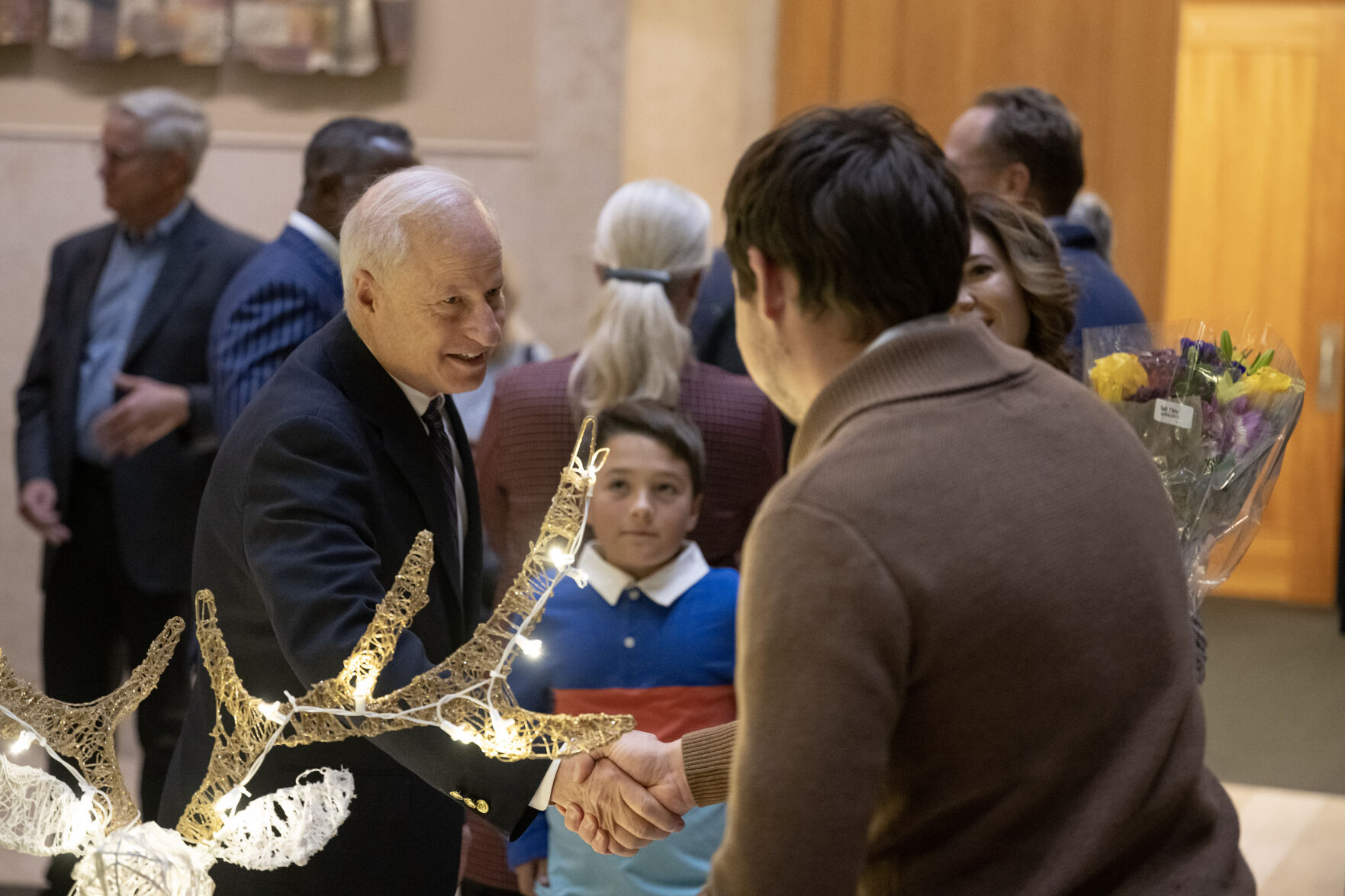 Aurora mayor Mike Coffman greets guests during a reception for new and returning Aurora City Council members on Monday, Dec. 4, 2023, at the Aurora Municipal Center in Aurora, Colo. (Timothy Hurst/Denver Gazette) (TimHursttim.hurst@gazette.comhttps://secure.gravatar.com/avatar/aca82bd62b4ee425c598527cd6faa1b1?d=mm&r=g)