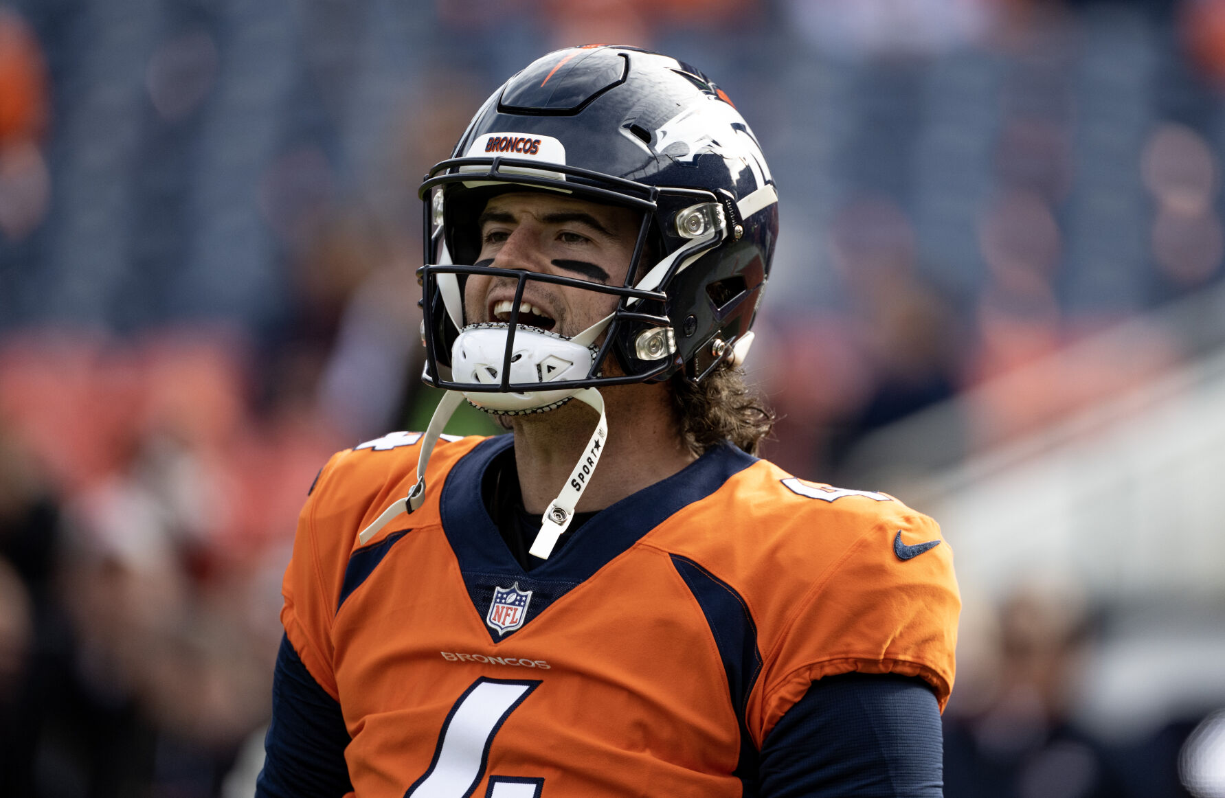 Denver Broncos quarterback Jarrett Stidham (4) warms up before a game against the Los Angeles Chargers on Sunday, Dec. 31, 2023, at Empower Field at Mile High in Denver, Colo. (Parker Seibold, The Gazette) (Parker Seibold)