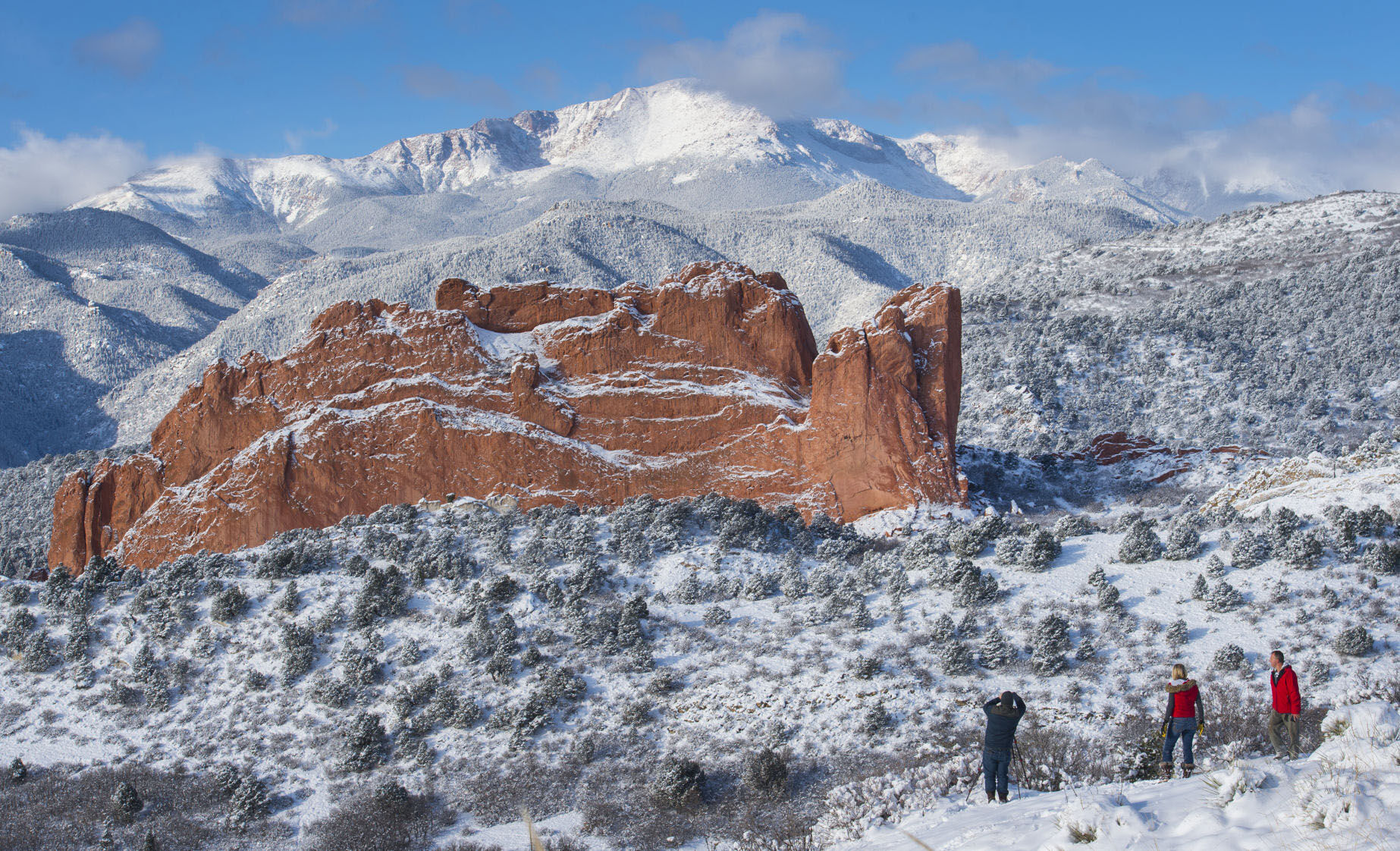 Fresh snow on Pikes Peak and the Garden of the Gods in November 2018 make for a breathtaking view for visitors at the Mesa Overlook in Colorado Springs. (The Gazette file)