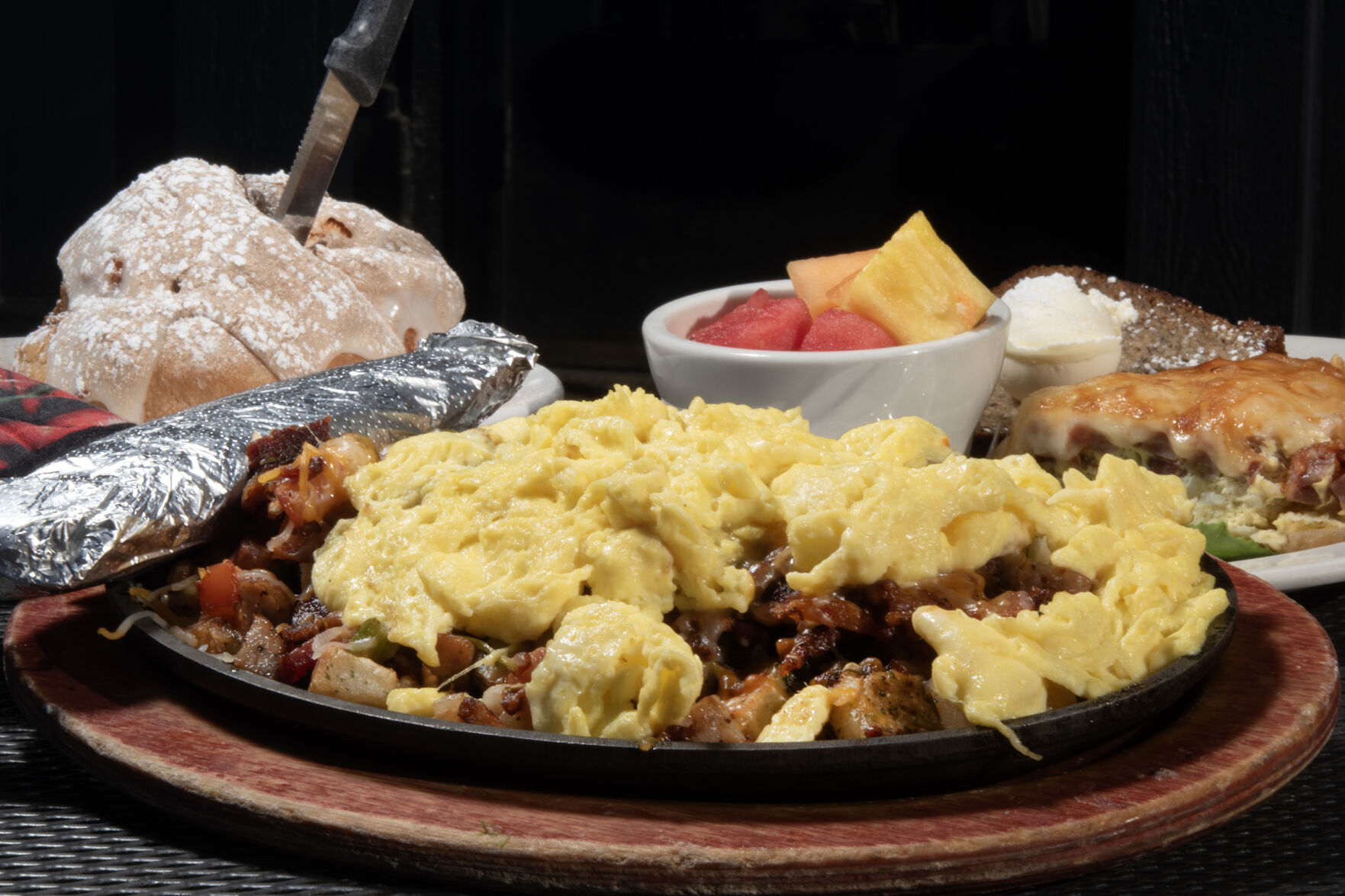 B & B Cafe (Located at: 324 Wilcox St. Castle Rock, CO.) “Ultimate Skillet with Flour Tortilla, Cinnamon Roll and Ham and Onion Quiche with Banana Bread” Tuesday November 21, 2023. Photo by Jeff Kearney. (Jeff Kearney)