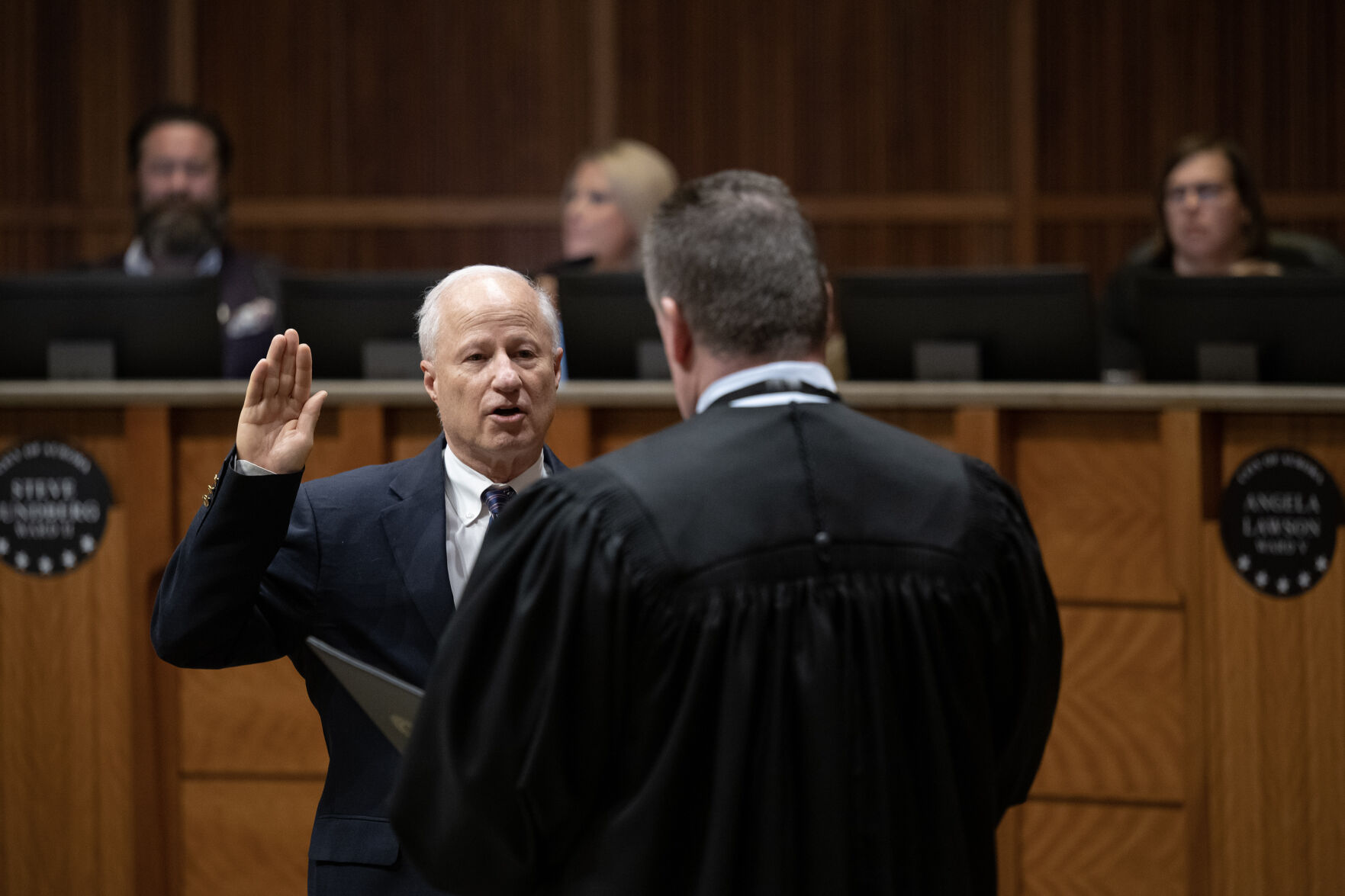 Aurora mayor Mike Coffman is sworn-in by judge Shawn Day during an Aurora City Council meeting on Monday, Dec. 4, 2023, at the Aurora Municipal Center in Aurora, Colo. (Timothy Hurst/Denver Gazette) (TimHursttim.hurst@gazette.comhttps://secure.gravatar.com/avatar/aca82bd62b4ee425c598527cd6faa1b1?d=mm&r=g)