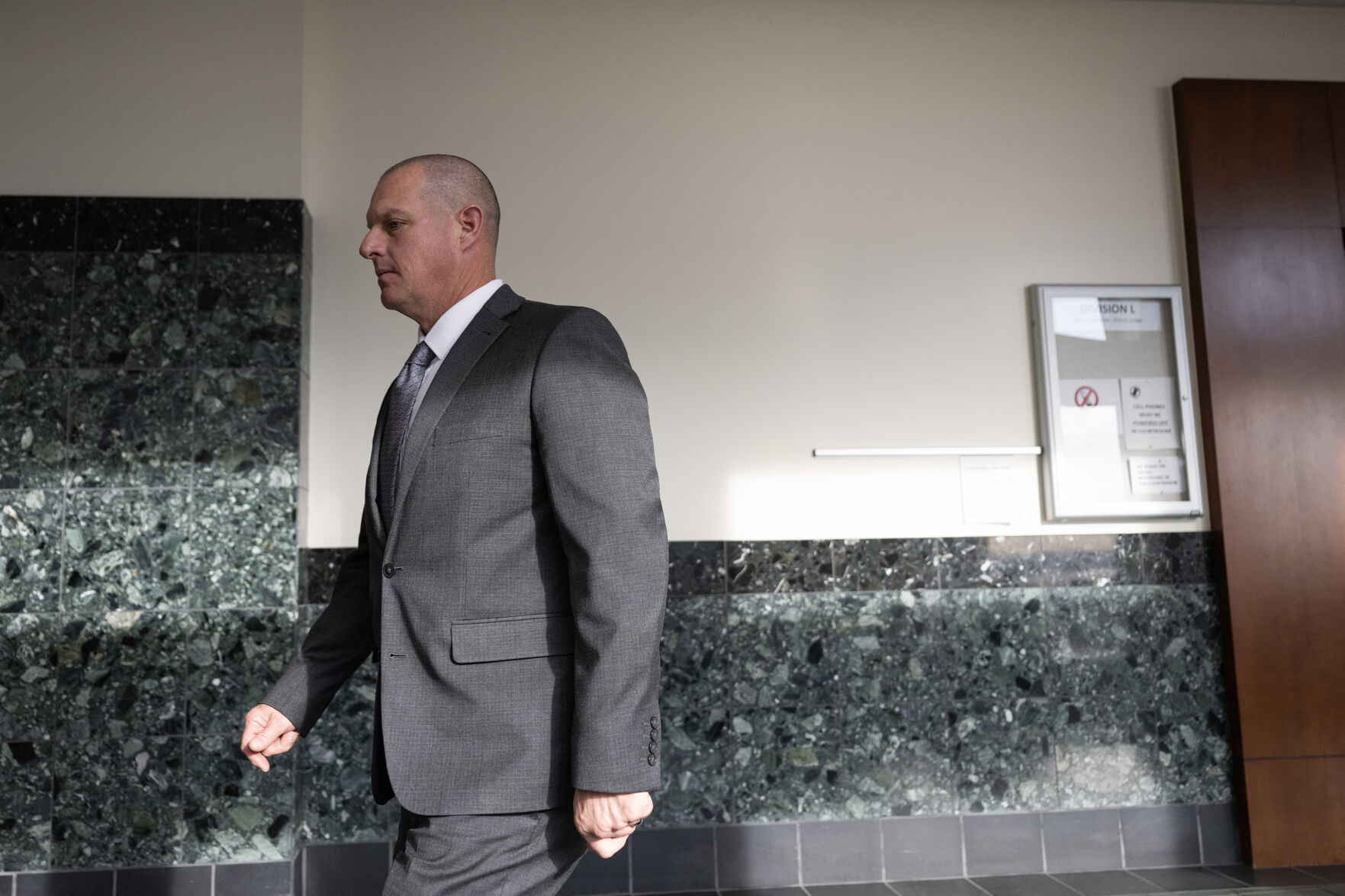 Aurora fire paramedic Lt. Peter Cichuniec leaves the courtroom during a morning break in his and paramedic Jeremy Cooper’s trial in the 2019 death of Elijah McClain on Wednesday at the Adams County Justice Center in Brighton. (TimHursttim.hurst@gazette.comhttps://secure.gravatar.com/avatar/aca82bd62b4ee425c598527cd6faa1b1?d=mm&r=g)