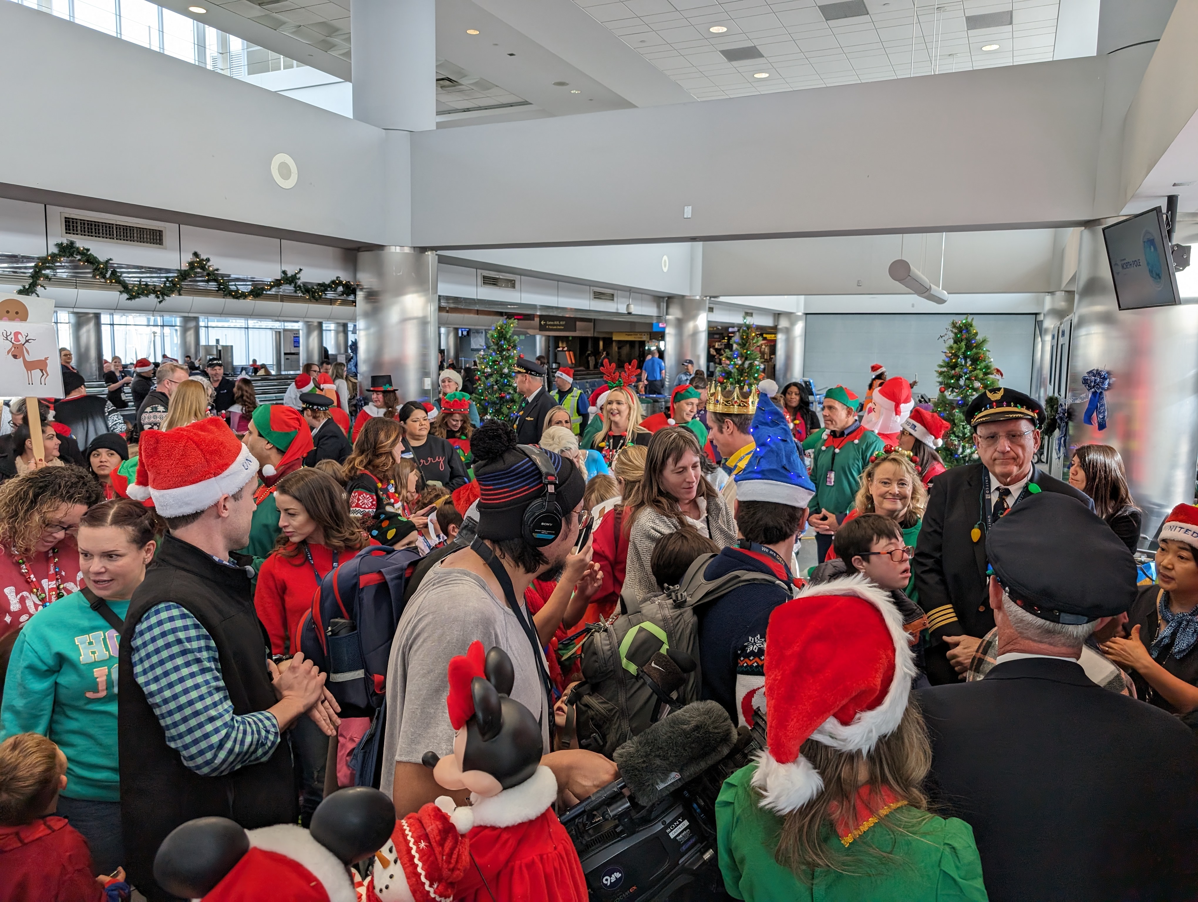 Over 75 children and their families waited at the DIA gate for the United flight that would take them around the Colorado Springs area for an hour before returning to the