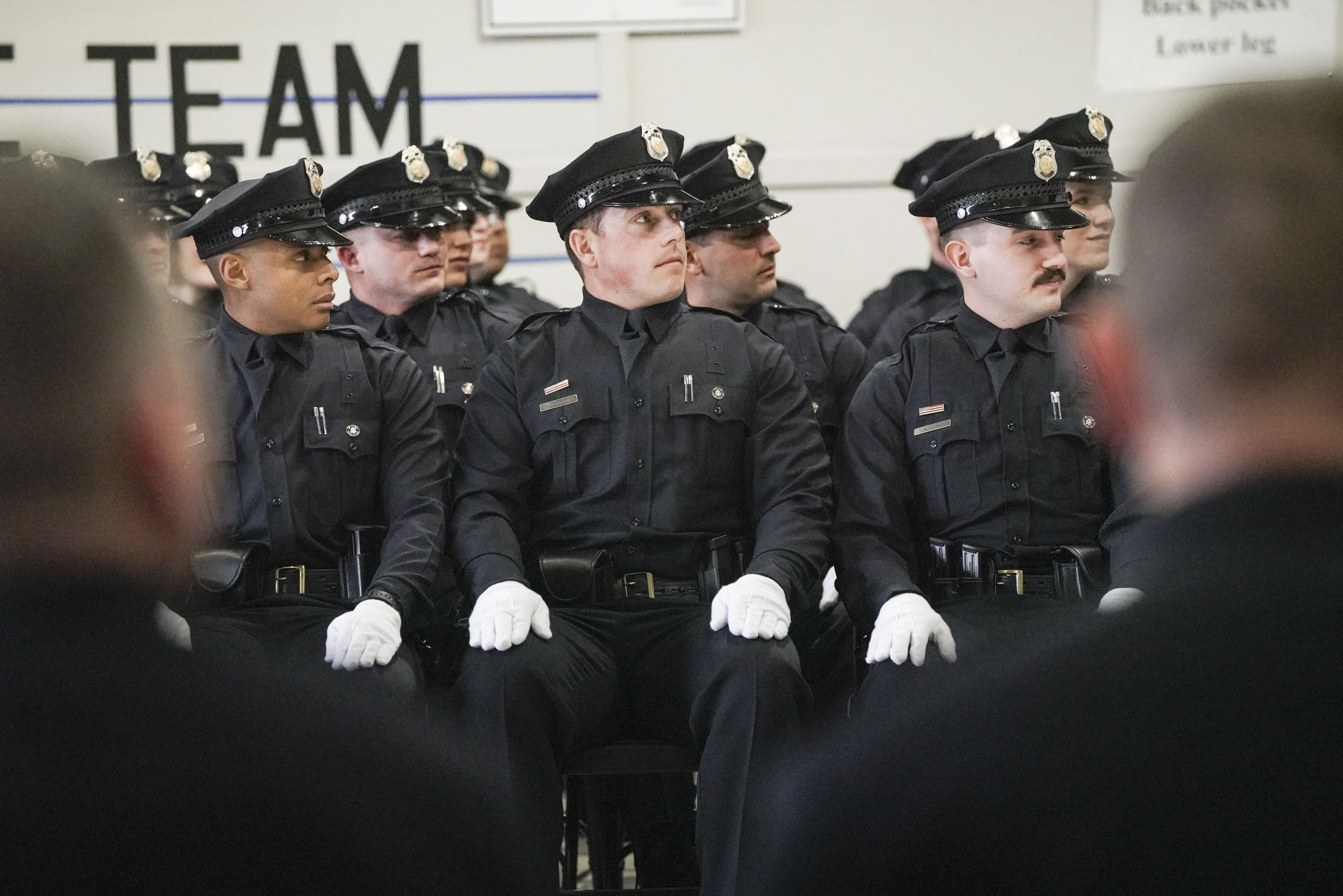 Denver Police Academy class 23-1 listens to Andrew Ulum speak during the ceremony at the Denver Police Training Academy on Friday, Dec. 1, 2023 in Denver, Colo. 47 recruit officers were sworn in as Denver Police officers during the ceremony. (Rebecca Slezak/Special to The Denver Gazette) (Rebecca Slezak)