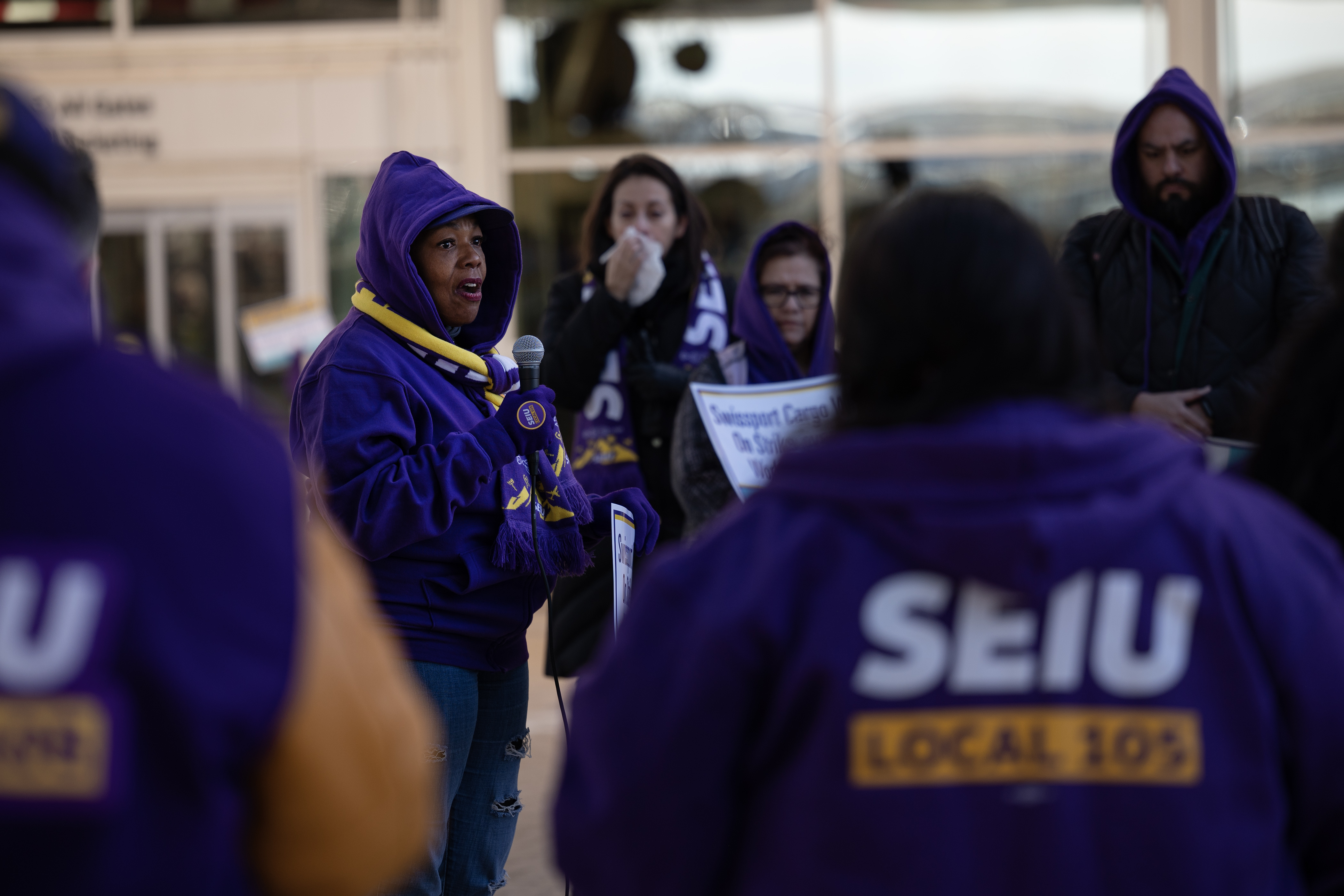 Service Employees International Union Local 105 Vice President of Healthcare Patricia Johnson-Gibson speaks to Swissport cargo workers and SEIU members during a rally on Monday, Dec. 11, 2023, in front of the Denver International Airport main terminal in Denver, Colo. (Timothy Hurst/Denver Gazette) (TimHursttim.hurst@gazette.comhttps://secure.gravatar.com/avatar/aca82bd62b4ee425c598527cd6faa1b1?d=mm&r=g)