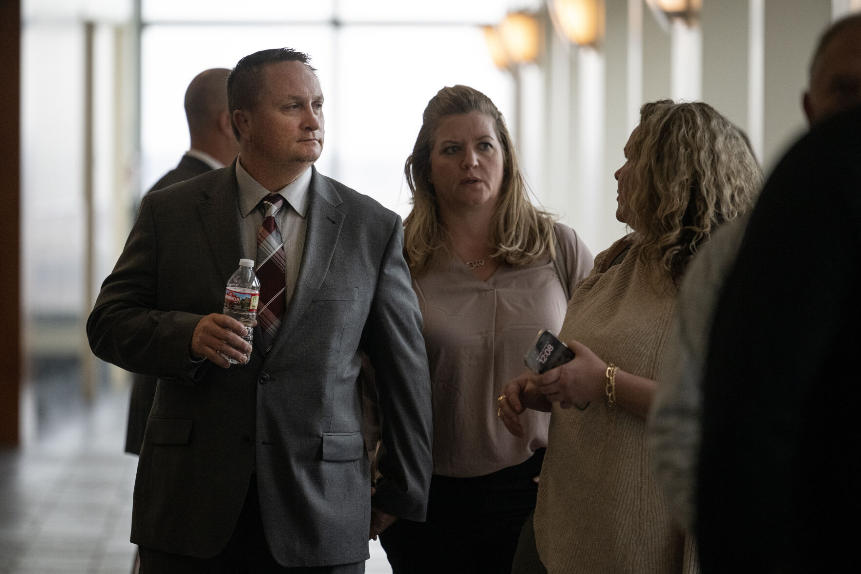 Aurora fire paramedic Jeremy Cooper, center, leaves the courtroom during a lunch break in his and Peter Cichuniec’s trial in the 2019 death of Elijah McClain, on Wednesday, Dec. 13, 2023, at the Adams County Justice Center in Brighton, Colo. (Timothy Hurst/Denver Gazette) (TimHursttim.hurst@gazette.comhttps://secure.gravatar.com/avatar/aca82bd62b4ee425c598527cd6faa1b1?d=mm&r=g)