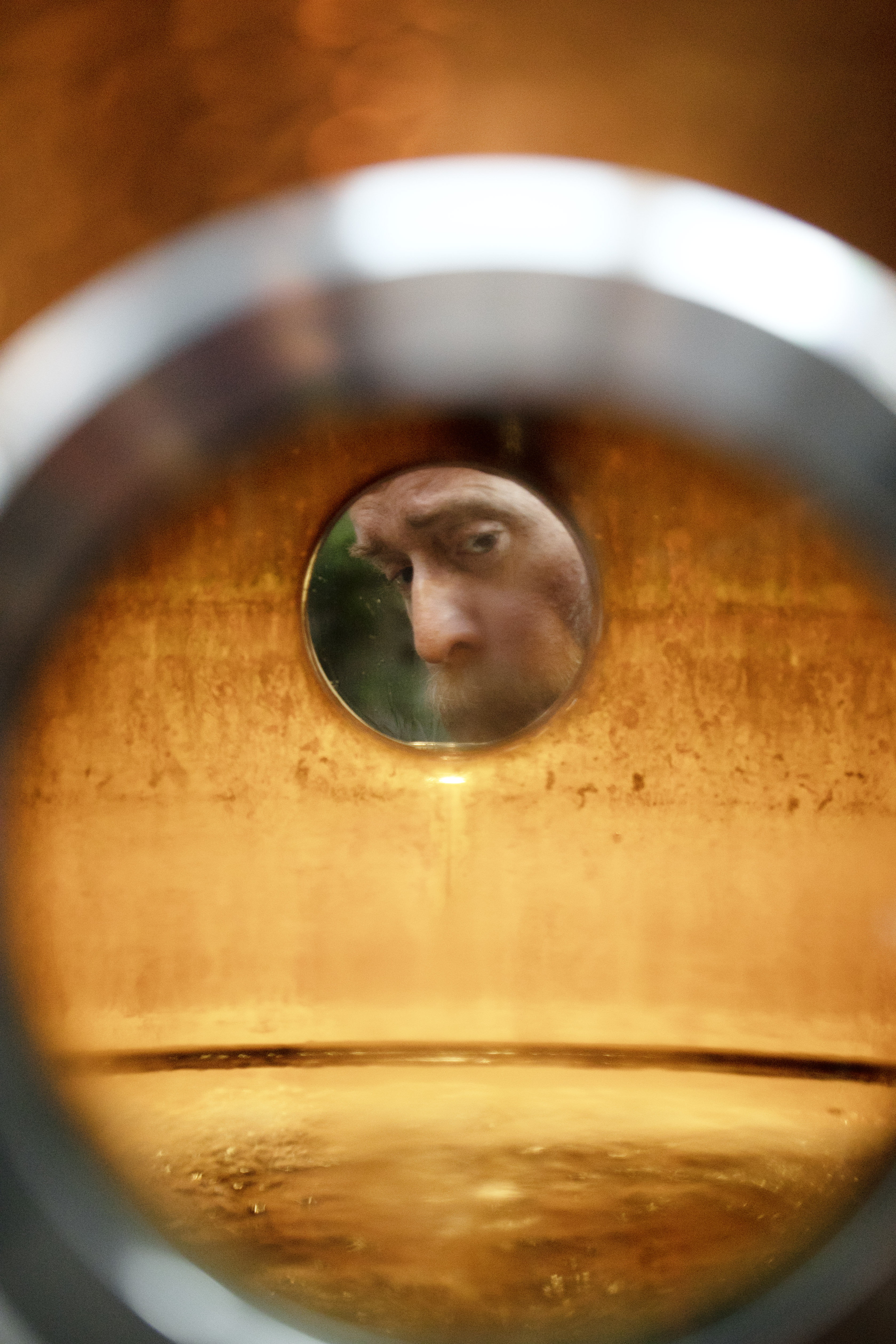 Rob Masters peers through the still, aptly named 