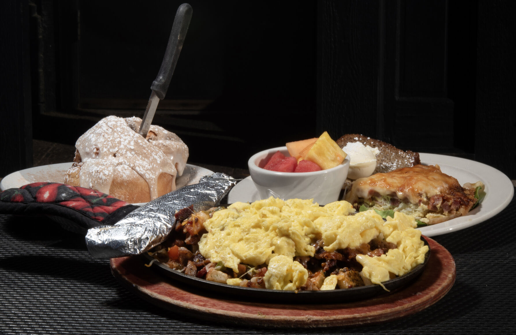 B & B Cafe (Located at: 324 Wilcox St. Castle Rock, CO.) “Ultimate Skillet with Flour Tortilla, Cinnamon Roll and Ham and Onion Quiche with Banana Bread” Tuesday November 21, 2023. Photo by Jeff Kearney. (Jeff Kearney)