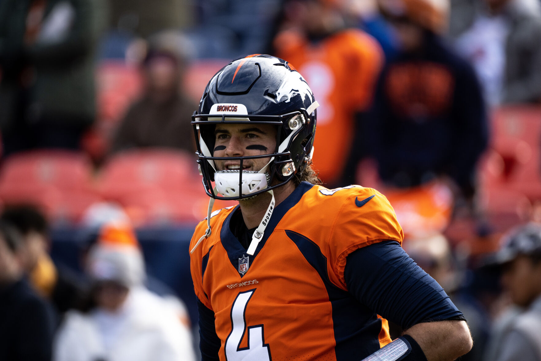 Denver Broncos quarterback Jarrett Stidham (4) warms up before a game against the Los Angeles Chargers on Sunday, Nov. 26, 2023, at Empower Field at Mile High in Denver, Colo. (Parker Seibold, The Gazette) (Parker Seibold)