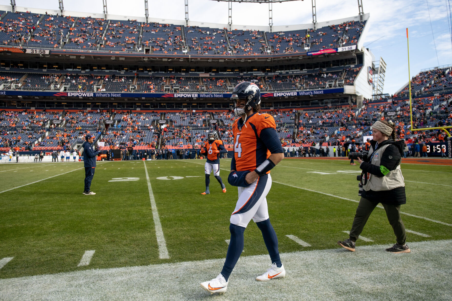 Denver Broncos quarterback Jarrett Stidham (4) on the field before a game against the Los Angeles Chargers on Sunday, Nov. 26, 2023, at Empower Field at Mile High in Denver, Colo. (Parker Seibold, The Gazette) (Parker Seibold)