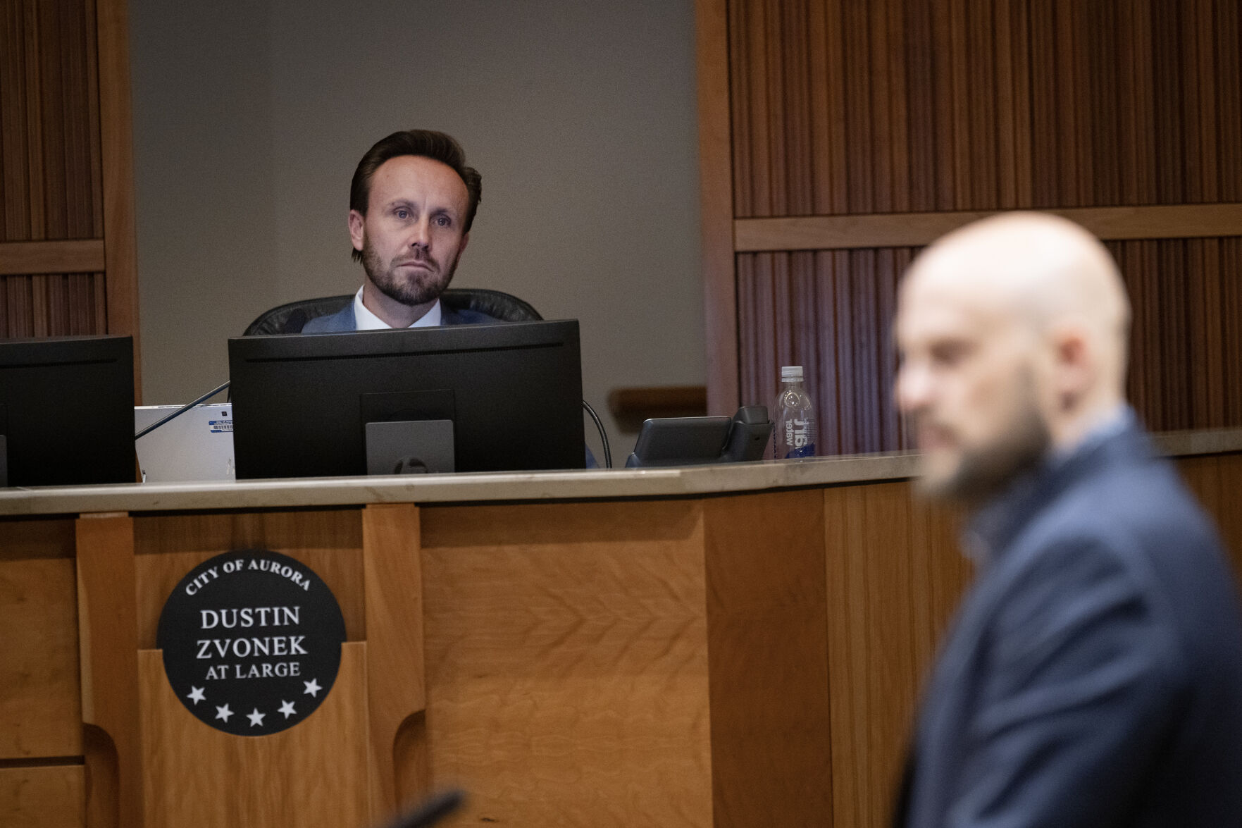 FILE PHOTO: Aurora City Council member Dustin Zvonek looks on from behind the dais during public comment during an Aurora City Council meeting on Monday, Dec. 4, 2023, at the Aurora Municipal Center in Aurora, Colo. (Timothy Hurst/Denver Gazette) (TimHursttim.hurst@gazette.comhttps://secure.gravatar.com/avatar/aca82bd62b4ee425c598527cd6faa1b1?d=mm&r=g)