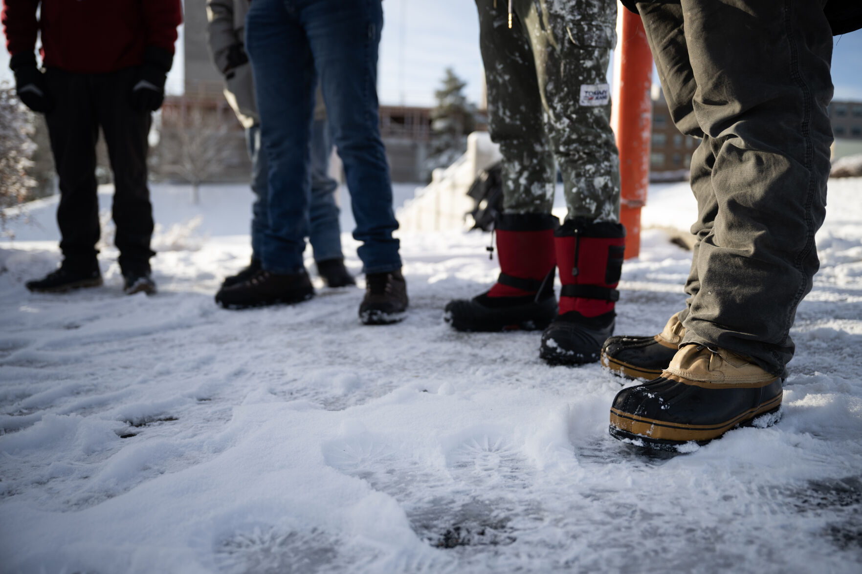 A group of immigrant workers wait for a potential day’s work near Denver’s Federal Boulevard and West 19th Avenue after an overnight snowstorm. (TimHursttim.hurst@gazette.comhttps://secure.gravatar.com/avatar/aca82bd62b4ee425c598527cd6faa1b1?d=mm&r=g)