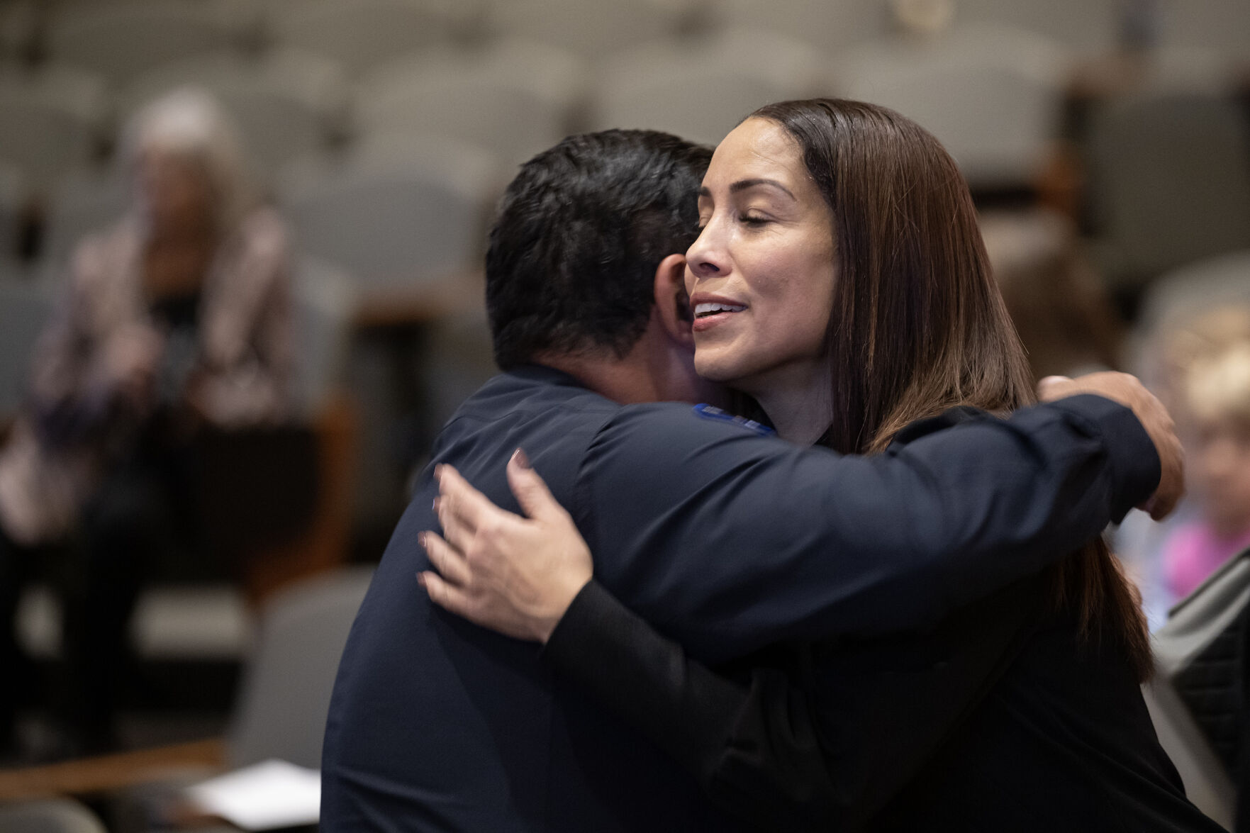 Aurora City Council member Angela Lawson hugs police chief Art Acevedo before an Aurora City Council meeting on Monday, Dec. 4, 2023, at the Aurora Municipal Center in Aurora, Colo. (Timothy Hurst/Denver Gazette) (TimHursttim.hurst@gazette.comhttps://secure.gravatar.com/avatar/aca82bd62b4ee425c598527cd6faa1b1?d=mm&r=g)