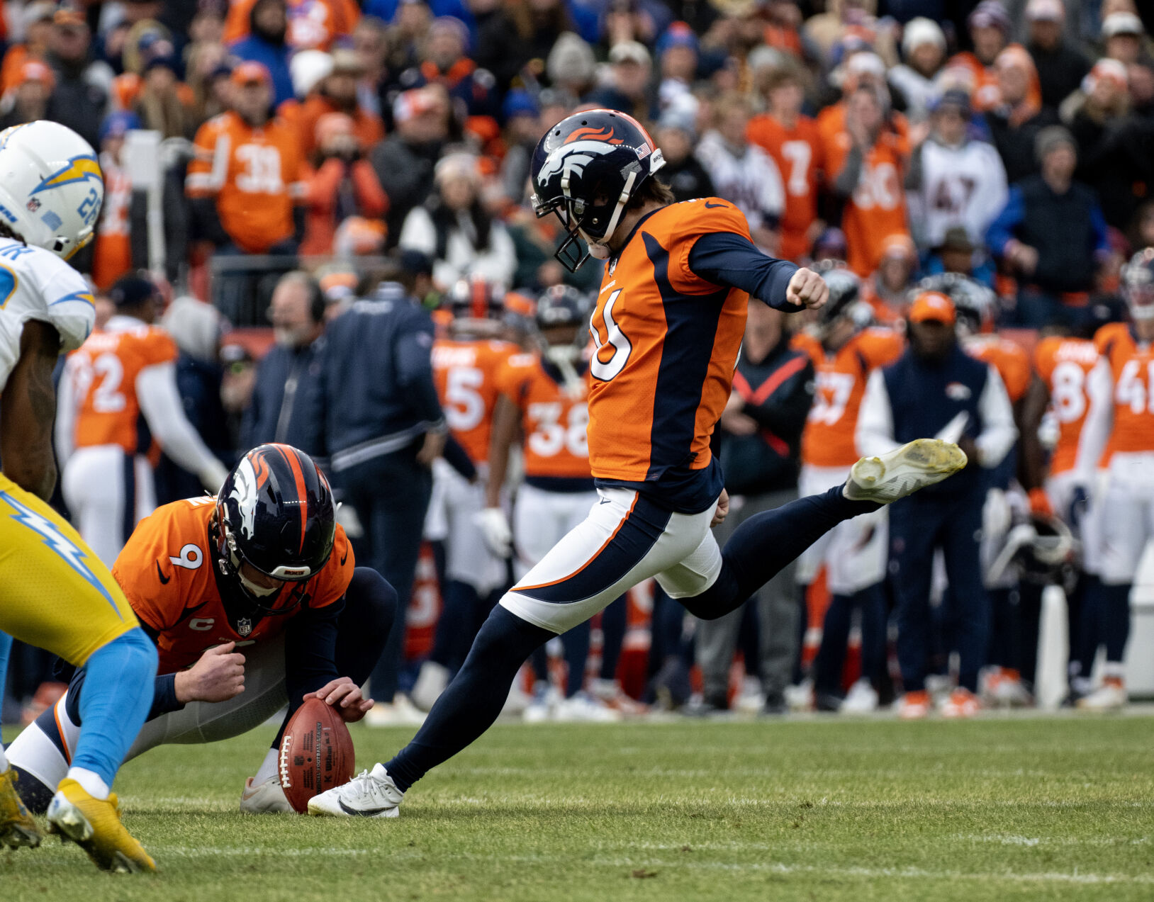 Broncos place kicker Wil Lutz kicks a field goal in the first half Sunday in Denver. (Parker Seibold, The Gazette)