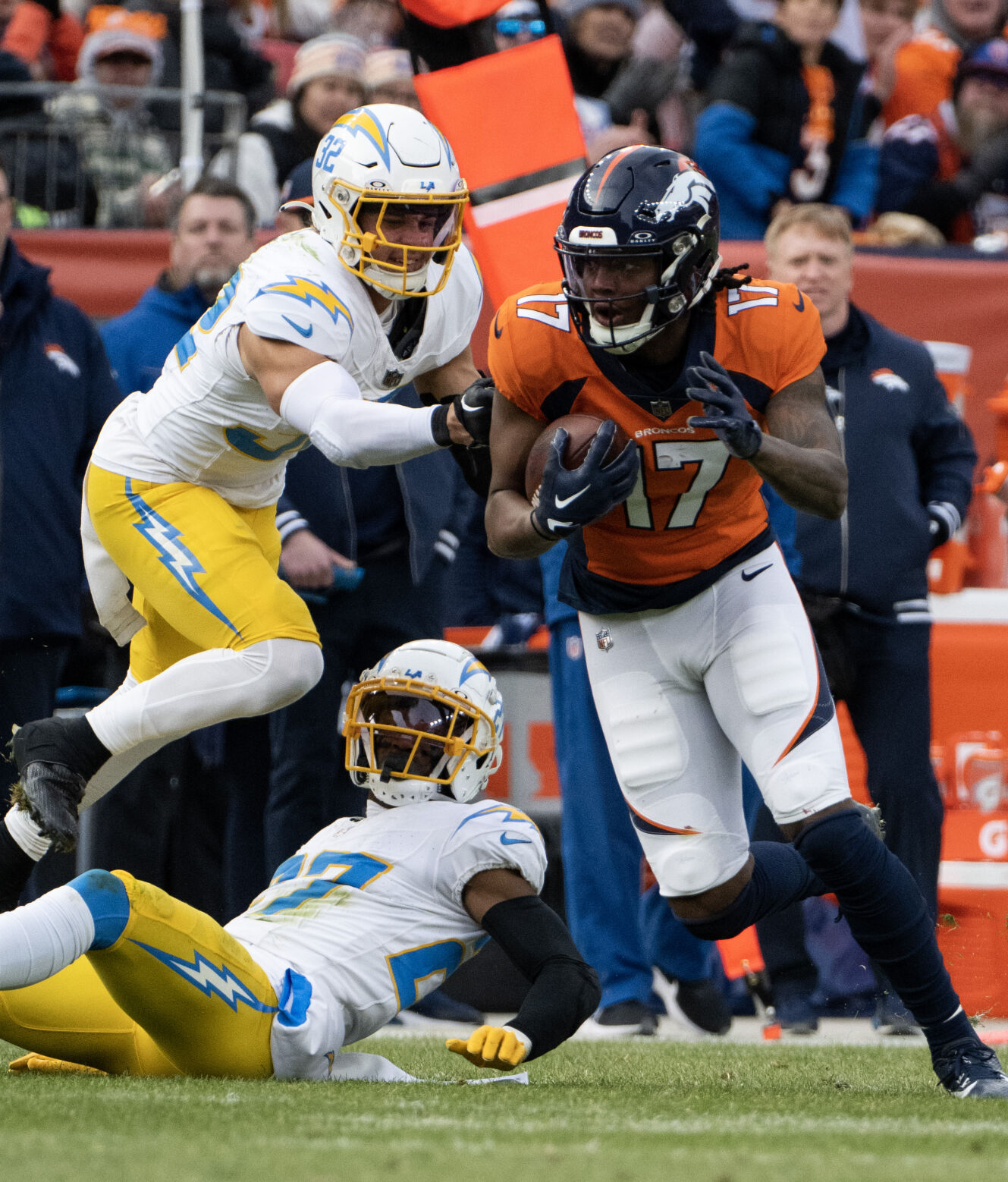 Denver Broncos wide receiver Lil'Jordan Humphrey (17) makes it past the Los Angeles Chargers’ defense and scores a touchdown in the first half of a game on Sunday, Nov. 26, 2023, at Empower Field at Mile High in Denver, Colo. (Parker Seibold, The Gazette) (Parker Seibold)