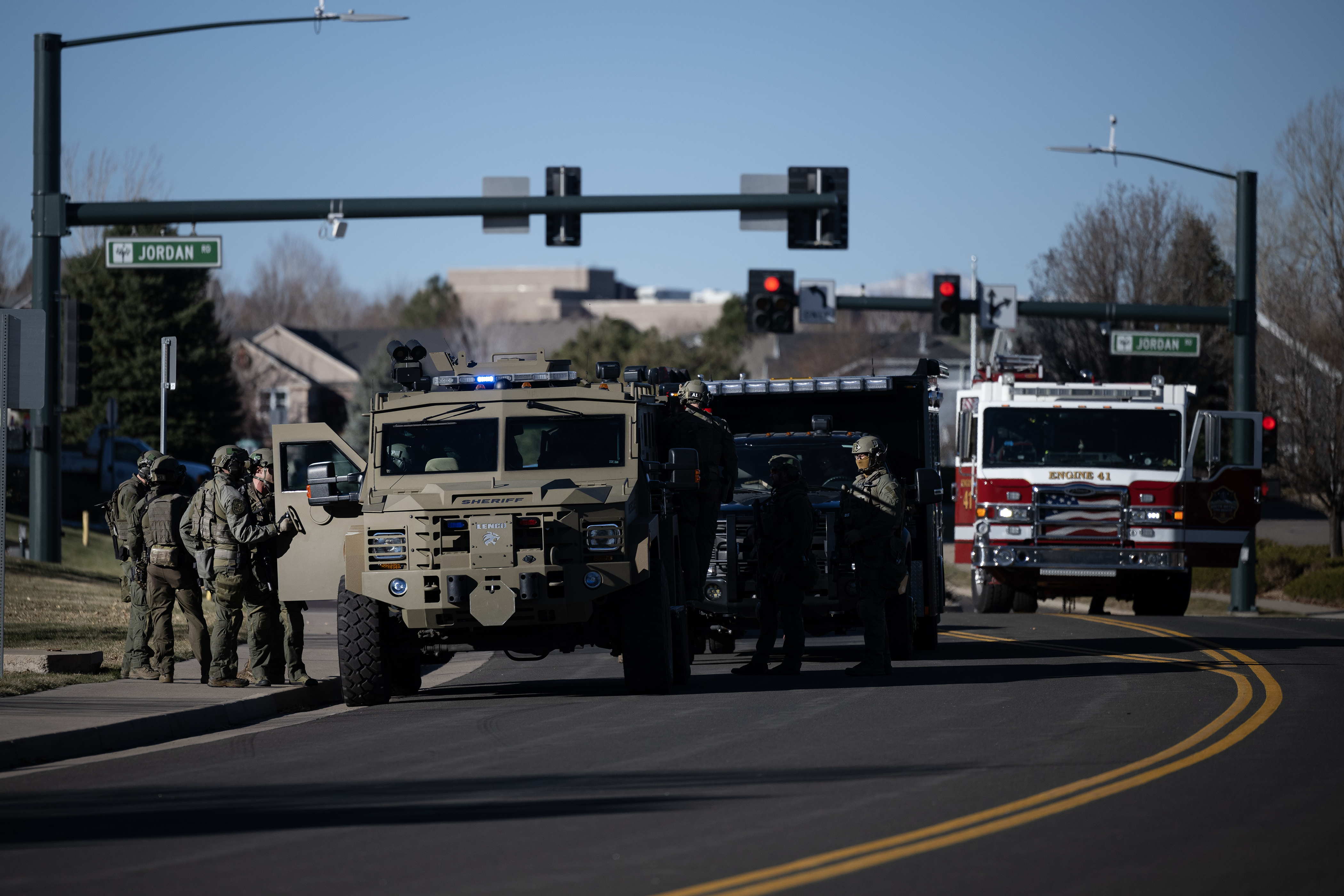 Douglas County Sheriff's Office SWAT team members wait next to a BearCat vehicle after responding to an incident involving a person barricaded in an apartment at a complex off South Wintergreen Parkway and Deer Horn Court, across the street from Southeast Christian Church & School on Wednesday, Dec. 6, 2023, in Parker, Colo. (Timothy Hurst/Denver Gazette) (TimHursttim.hurst@gazette.comhttps://secure.gravatar.com/avatar/aca82bd62b4ee425c598527cd6faa1b1?d=mm&r=g)