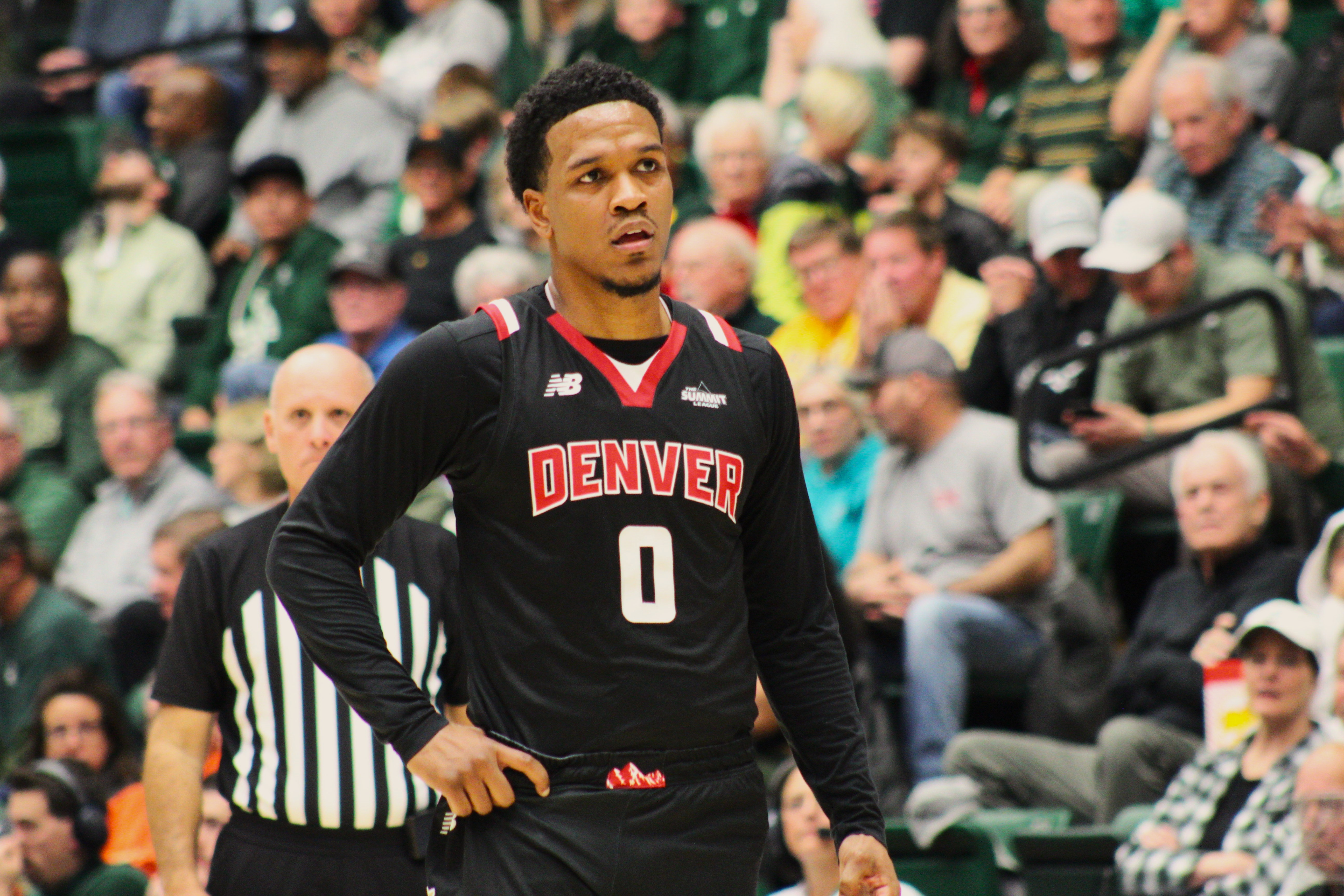 Denver senior guard Tommy Bruner (0) looks on during a game against Colorado State on Wednesday, Dec. 6, 2023 at Moby Arena in Fort Collins. (Tyler King, The Denver Gazette)