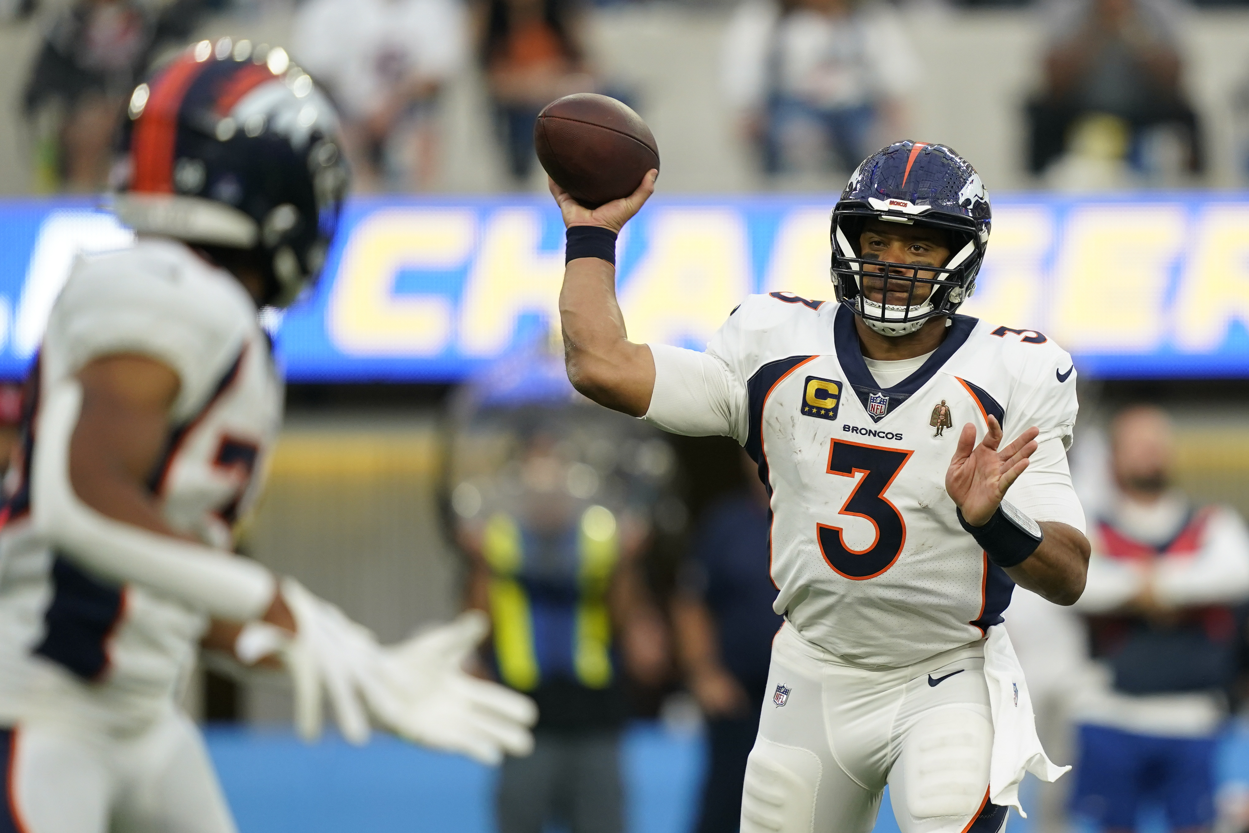 Denver Broncos quarterback Russell Wilson (3) passes against the Los Angeles Chargers, Sunday in Inglewood, Calif. (the associated press)
