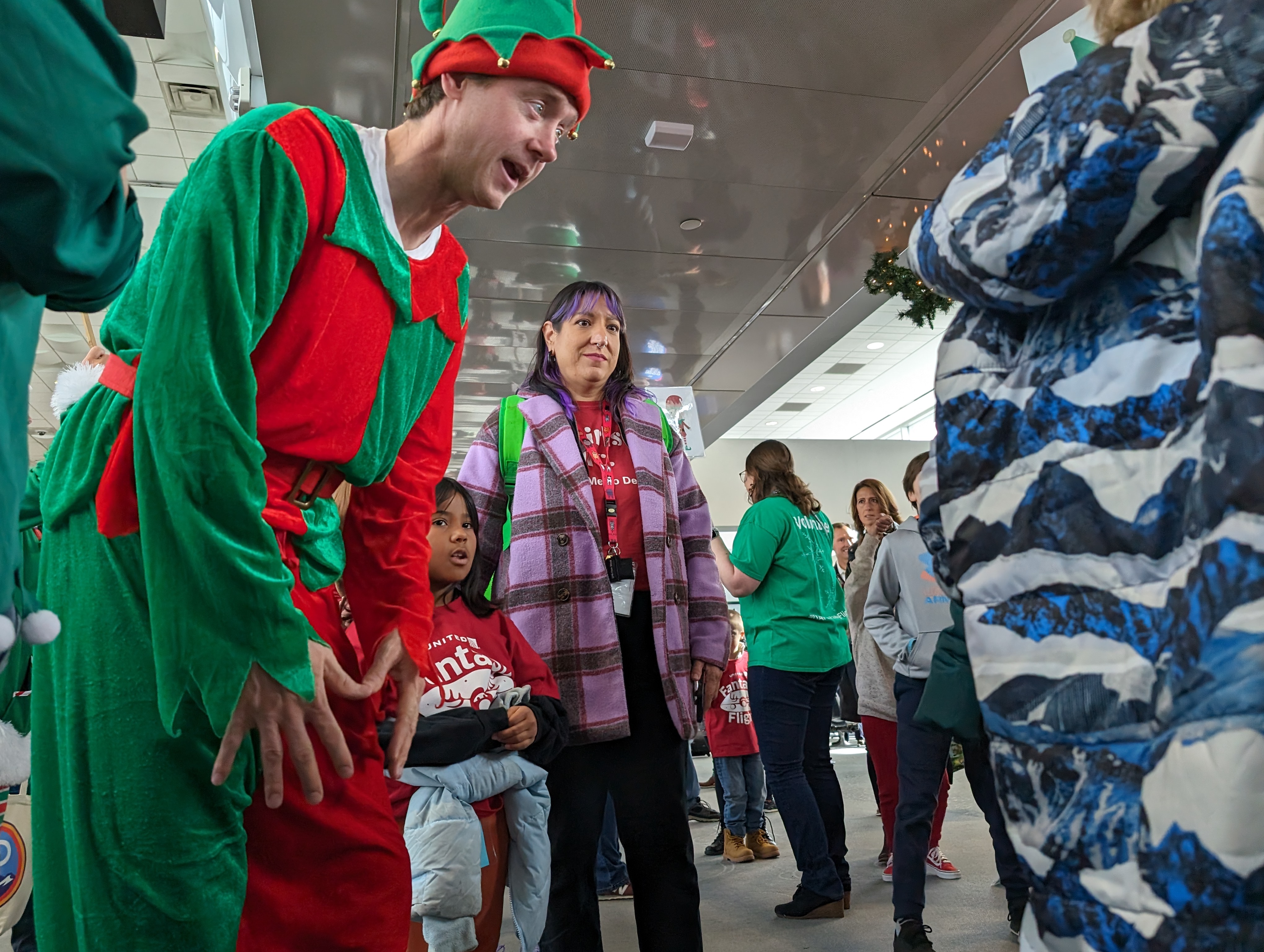 ‘An experience they’ll never forget’ : United Fantasy Flight at DIA transports children to ‘North Pole’