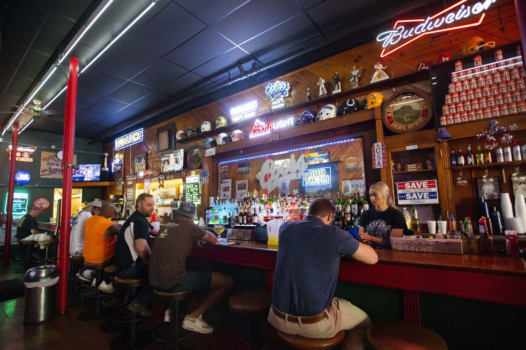 Madisyn Furgeson works the bar at the historic Coors Tavern Thursday, July 22, 2021, in downtown Pueblo. (The Gazette, Christian Murdock)