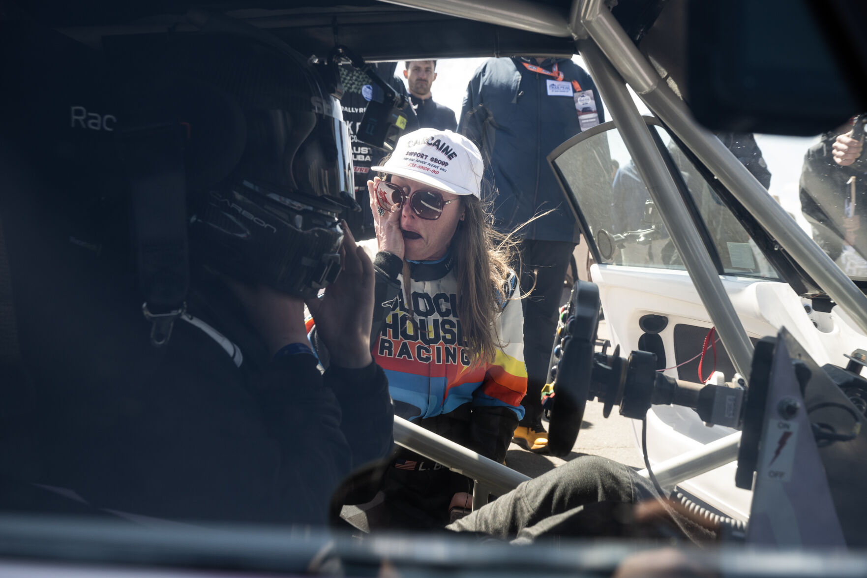 Driver Lucy Block wipes away a tear as she greets her daughter Lia Block at the summit after Lia drove her late father’s car, named “Hoonipigasus,” in a tribute drive to honor Ken Block during The Broadmoor Pikes Peak International Hill Climb on Sunday, June 25, 2023, in El Paso County, Colo. (Timothy Hurst/Denver Gazette) (TimHursttim.hurst@gazette.comhttps://secure.gravatar.com/avatar/aca82bd62b4ee425c598527cd6faa1b1?d=mm&r=g)