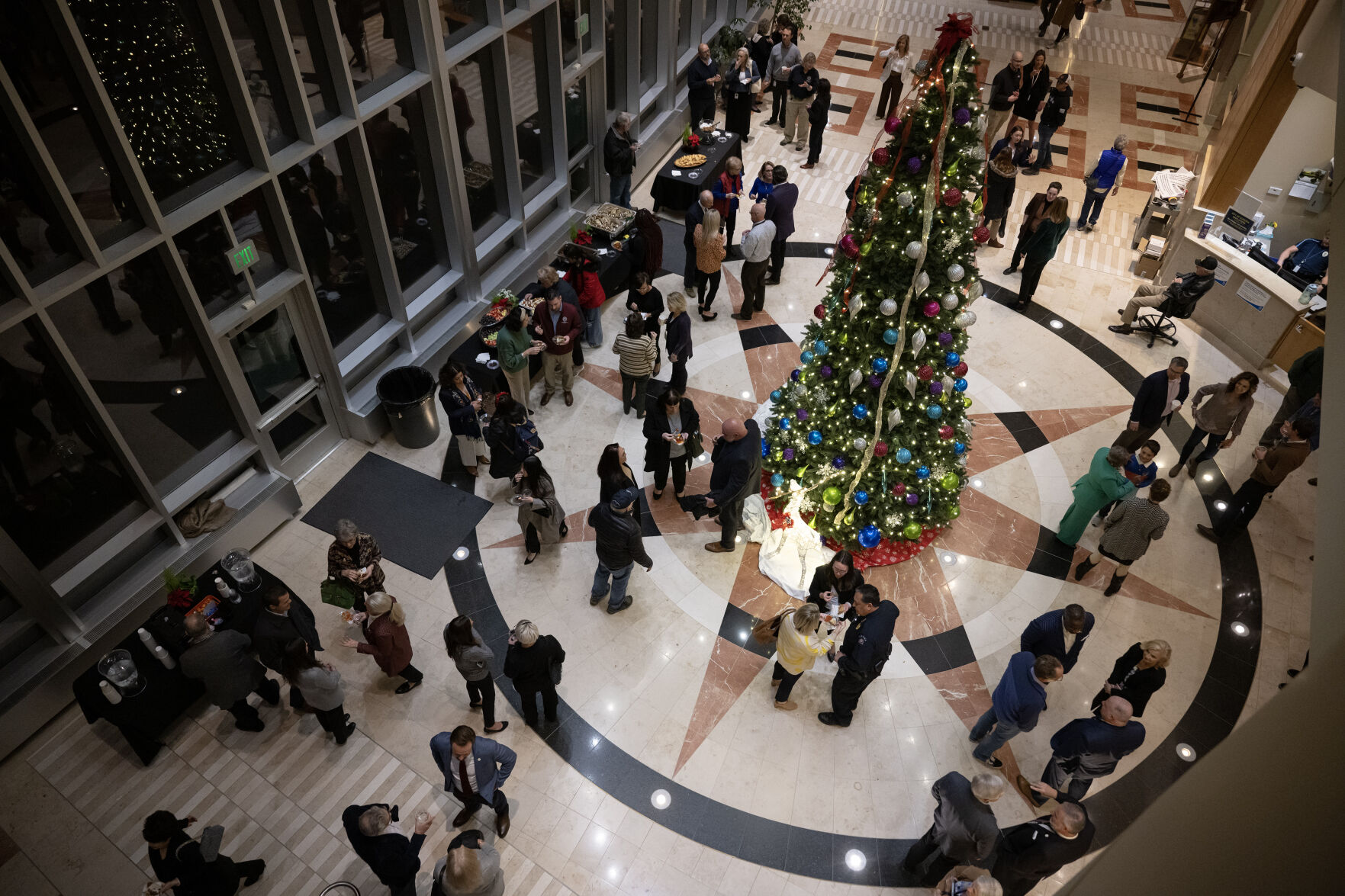 Guests gather in the lobby outside City Council Chambers during a reception for new and returning Aurora City Council members on Monday, Dec. 4, 2023, at the Aurora Municipal Center in Aurora, Colo. (Timothy Hurst/Denver Gazette) (TimHursttim.hurst@gazette.comhttps://secure.gravatar.com/avatar/aca82bd62b4ee425c598527cd6faa1b1?d=mm&r=g)