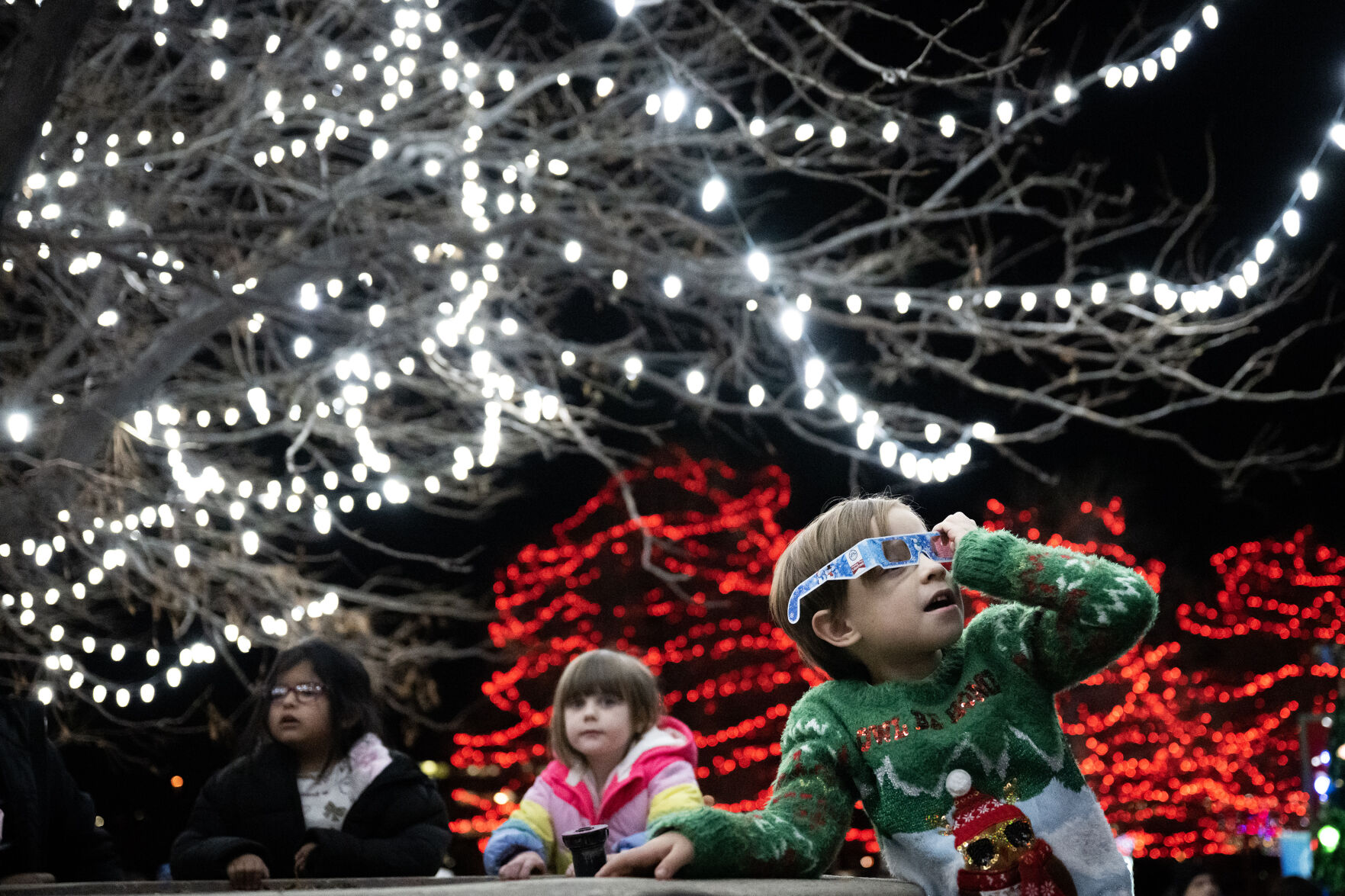 Adrian Detwiler, 6, checks out the lights with his holiday specs during the city of Aurora’s annual Holiday Tree Lighting on Tuesday, Dec. 5, 2023, at the Aurora Municipal Center. (Timothy Hurst/Denver Gazette) (TimHursttim.hurst@gazette.comhttps://secure.gravatar.com/avatar/aca82bd62b4ee425c598527cd6faa1b1?d=mm&r=g)