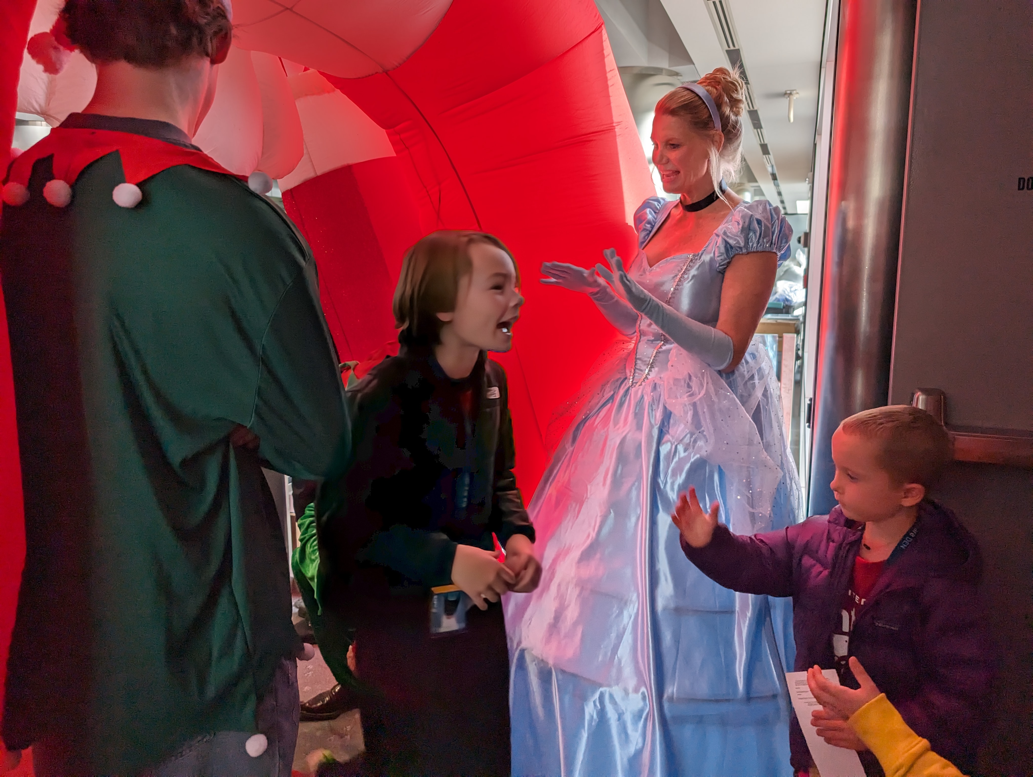 Children were greeted by various characters and costumed-employees, like Cinderella, as they boarded the plane and landed at the North Pole hangar. (SageKelleyJefferson County Reportersage.kelley@denvergazette.comhttps://denvergazette.com/content/tncms/avatars/e/5f/457/e5f45740-2717-11ee-85b2-ab80f2d36252.5b966c1d2ce4987987665d57c237eda4.png)