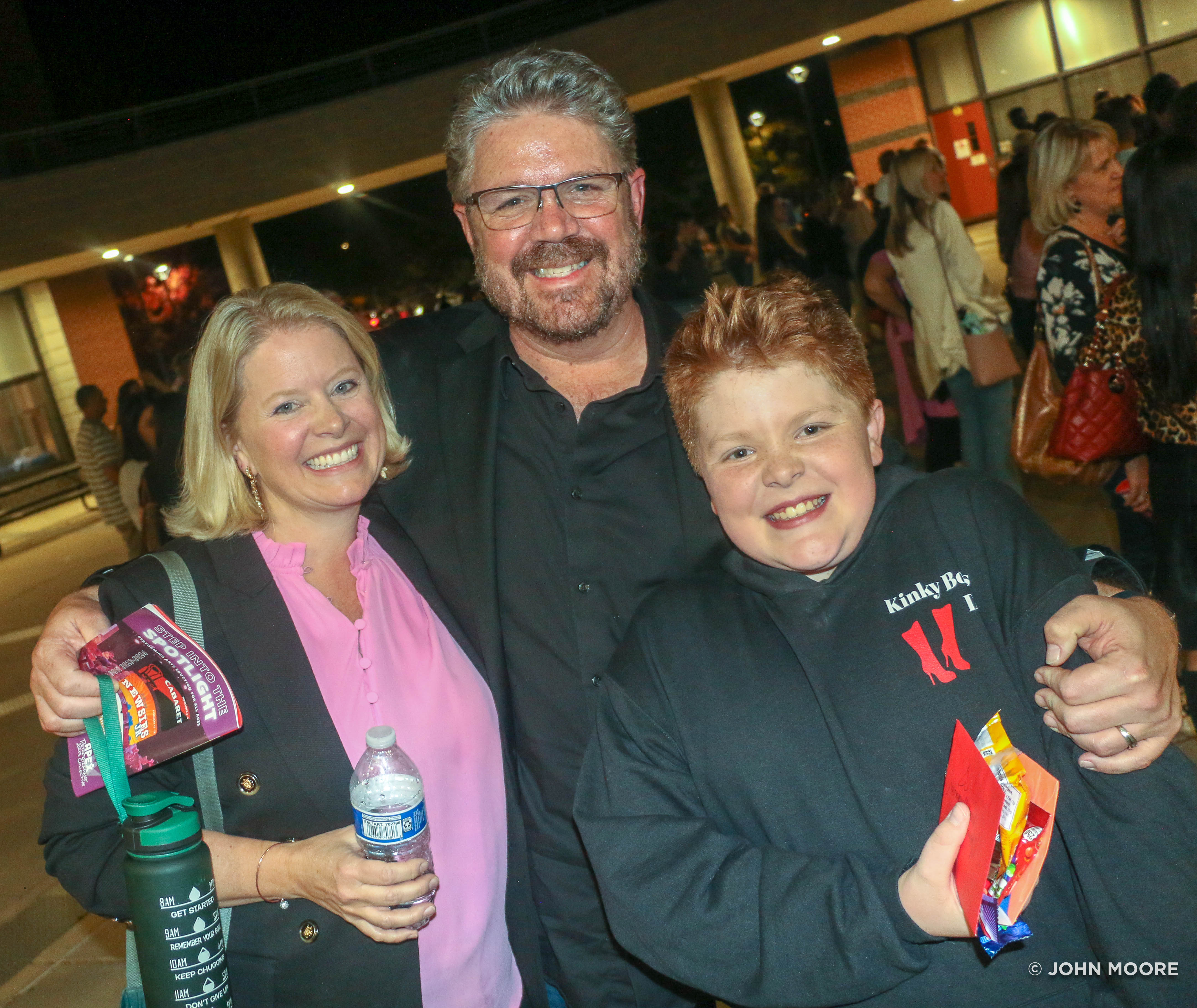Proud parents Michelle and Brian Merz-Hutchinson greet son Mason after his performance in 