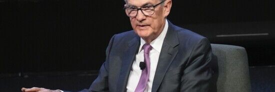 Fed officials pencil in three rate cuts for 2024