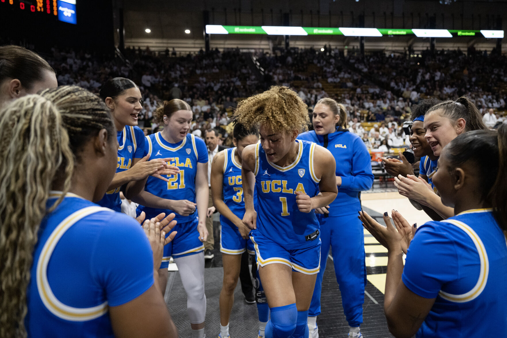 UCLA Bruins guard Kiki Rice (1) dances in the huddle before a game against the Colorado Buffaloes on Friday, Jan. 19, 2024, at the CU Event Center in Boulder, Colo.(Timothy Hurst/Denver Gazette) (TimHursttim.hurst@gazette.comhttps://secure.gravatar.com/avatar/aca82bd62b4ee425c598527cd6faa1b1?d=mm&r=g)