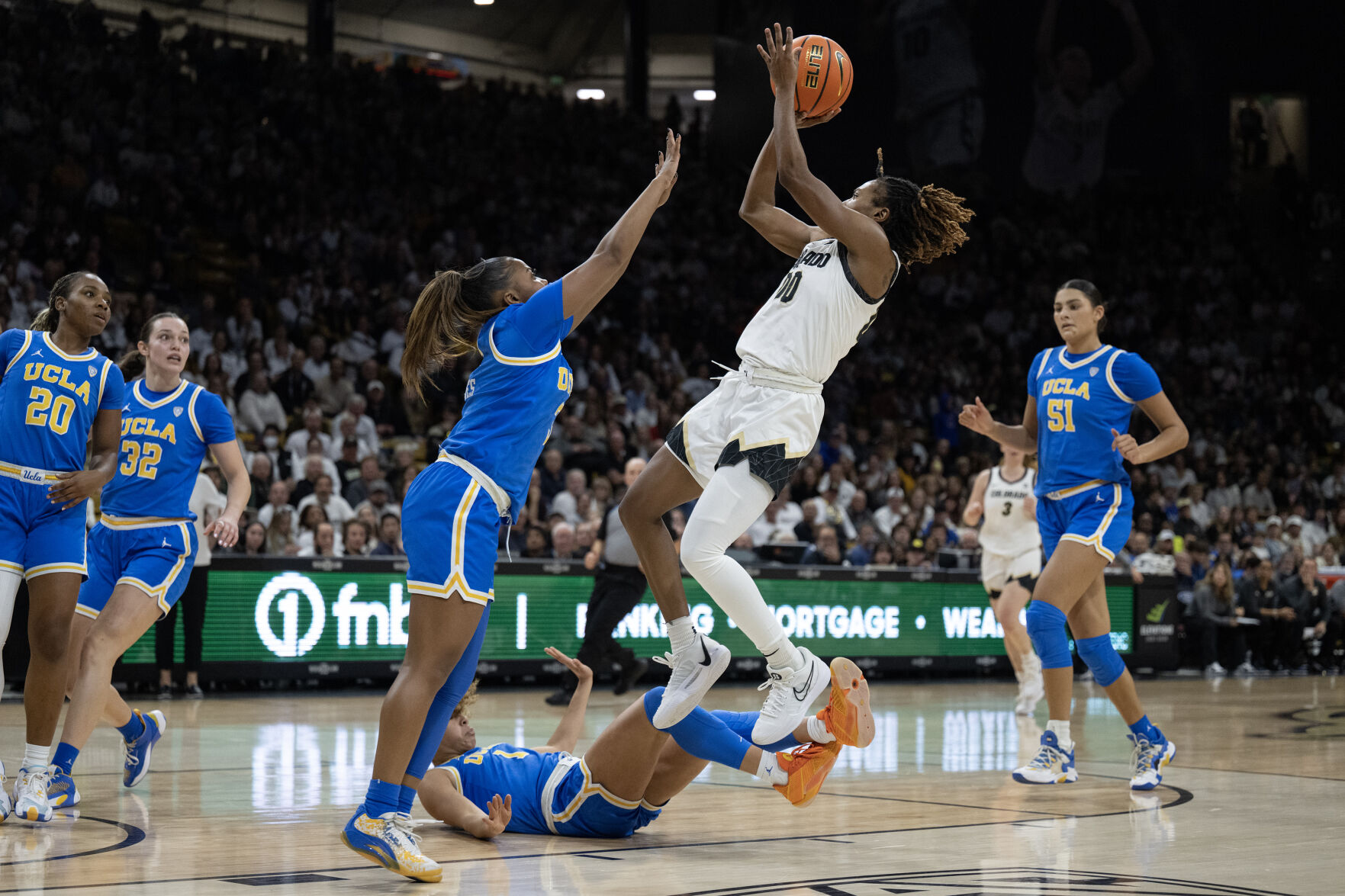 Colorado Buffaloes guard Jaylyn Sherrod (0) gets the and-one during a game against the UCLA Bruins on Friday, Jan. 19, 2024, at the CU Event Center in Boulder, Colo.(Timothy Hurst/Denver Gazette) (TimHursttim.hurst@gazette.comhttps://secure.gravatar.com/avatar/aca82bd62b4ee425c598527cd6faa1b1?d=mm&r=g)
