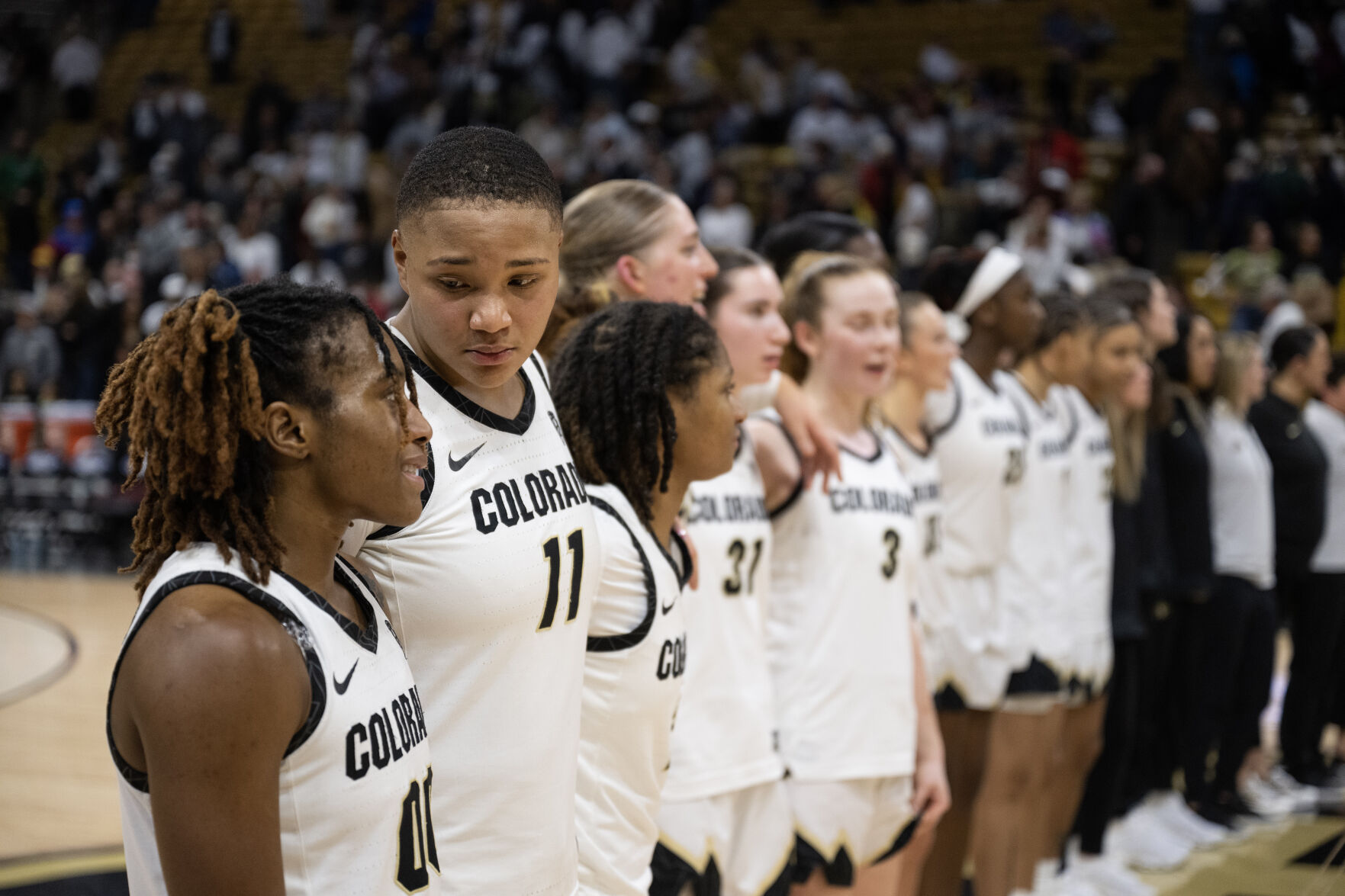 Colorado Buffaloes forward Quay Miller (11) comforts guard Jaylyn Sherrod (0) after a loss to the UCLA Bruins on Friday, Jan. 19, 2024, at the CU Event Center in Boulder, Colo.(Timothy Hurst/Denver Gazette) (TimHursttim.hurst@gazette.comhttps://secure.gravatar.com/avatar/aca82bd62b4ee425c598527cd6faa1b1?d=mm&r=g)