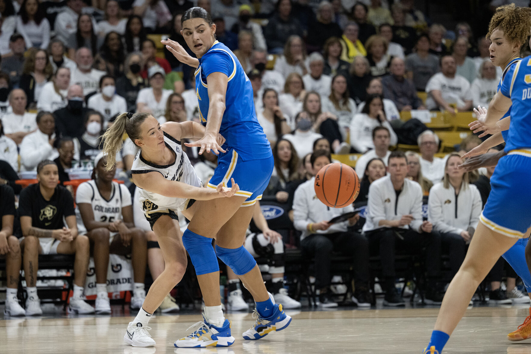 Colorado Buffaloes guard Kindyll Wetta (15) gets a pass past UCLA Bruins center Lauren Betts (51) on Friday, Jan. 19, 2024, at the CU Event Center in Boulder, Colo.(Timothy Hurst/Denver Gazette) (TimHursttim.hurst@gazette.comhttps://secure.gravatar.com/avatar/aca82bd62b4ee425c598527cd6faa1b1?d=mm&r=g)