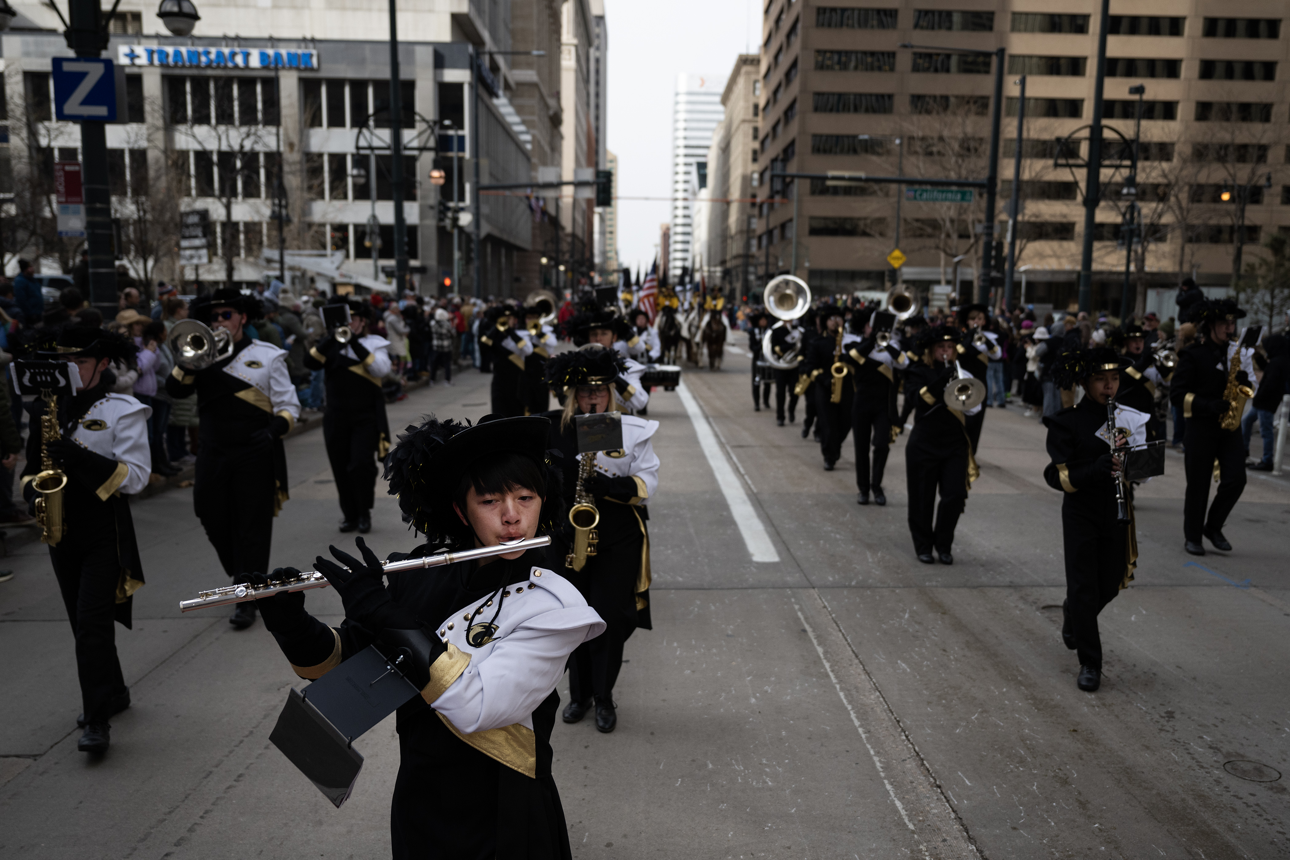 Prairie View High School freshman flutist Tahying Lee marches down 17th Street with the rest of the band during The National Western Stock Show Kick-off Parade on Thursday, Jan. 4, 2024, in Denver, Colo. (Timothy Hurst/Denver Gazette) (TimHursttim.hurst@gazette.comhttps://secure.gravatar.com/avatar/aca82bd62b4ee425c598527cd6faa1b1?d=mm&r=g)