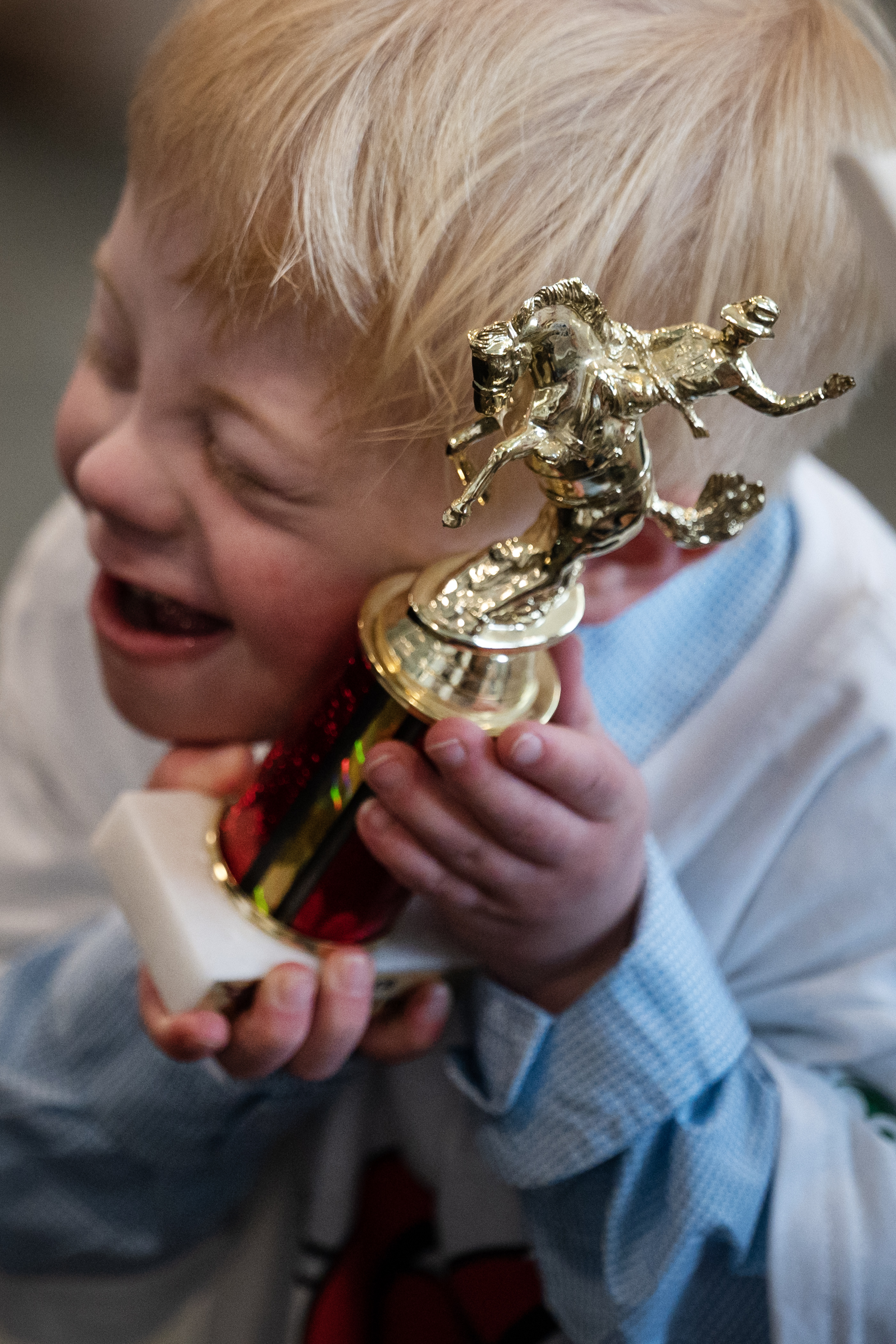 Five-year-old Brody Dehn from Loveland nuzzles the trophy he received during the annual PRCA Exceptional Rodeo on Thursday, Jan. 18, 2024, at the Temple Grandin Equine Center at Colorado State University Spur in Denver, Colo.(Timothy Hurst/Denver Gazette) (TimHursttim.hurst@gazette.comhttps://secure.gravatar.com/avatar/aca82bd62b4ee425c598527cd6faa1b1?d=mm&r=g)