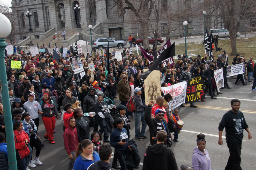 Frigid temps shorten MLK Day Marade in downtown Denver