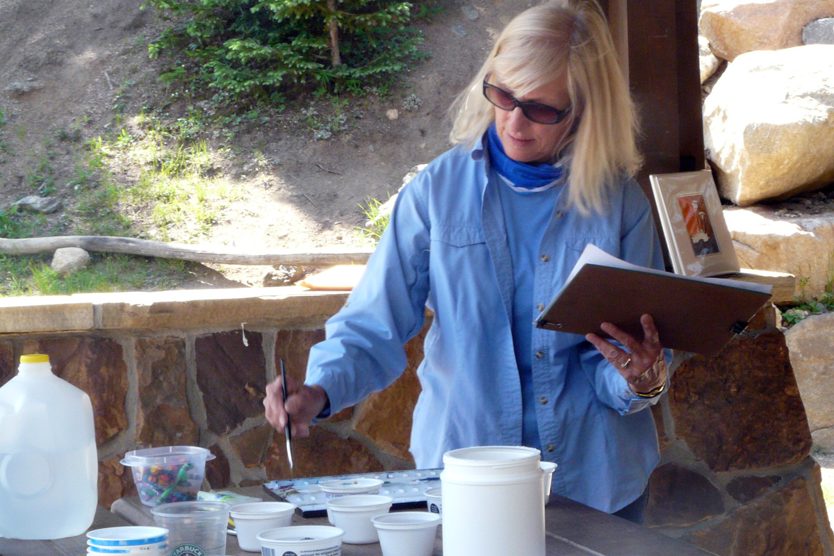 Joy Keown, former Rocky Mountain National Park artist in residence, pictured while painting. The residency program is coming back. (Courtesy Rocky Mountain National Park)