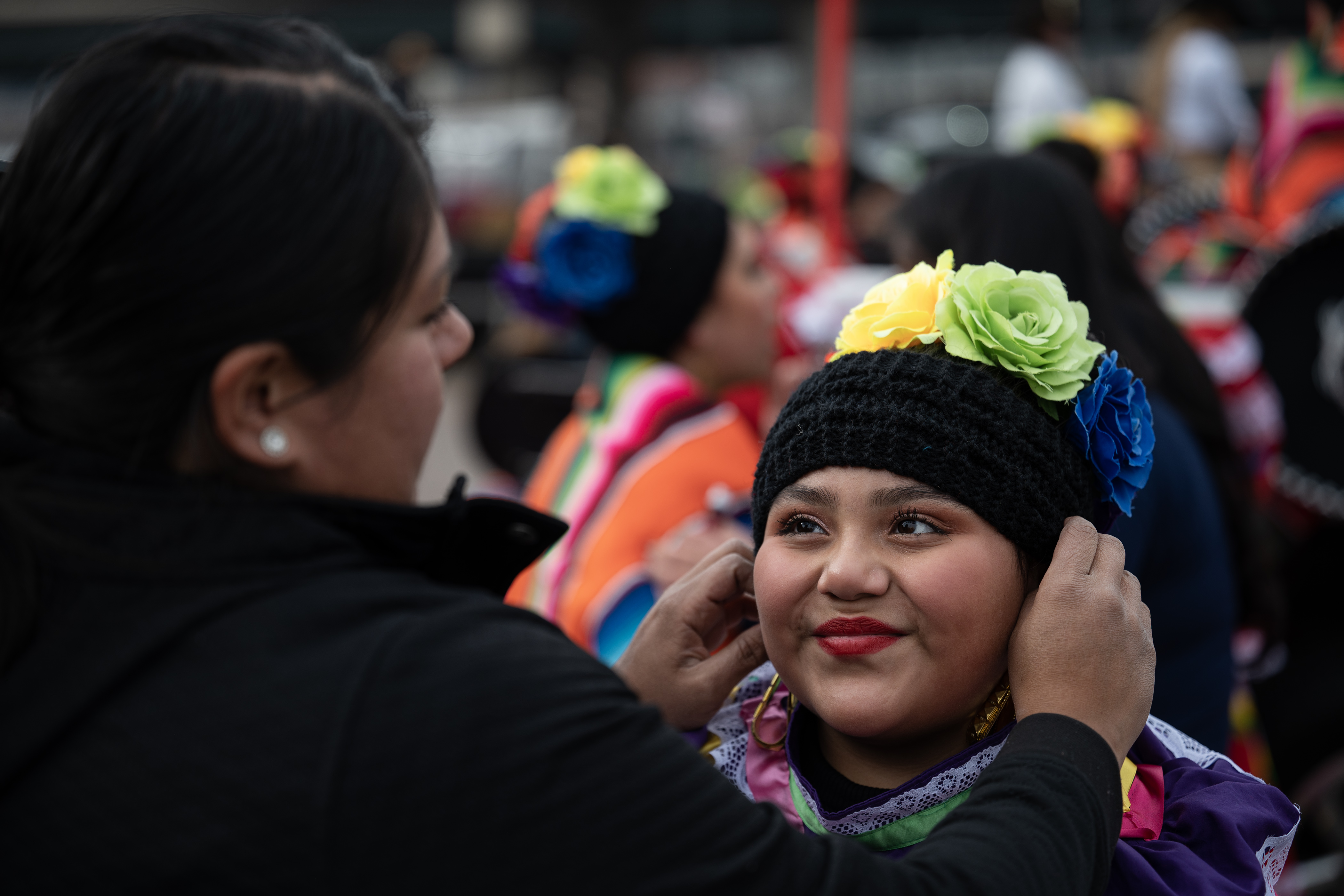 Alondra Lomes, 10, looks back at her mother Rosita Vazquez after Vazquez helps get her ready to dance in the parade with others from Lisa T's Dance Academy, the official dancers of the Mexican Rodeo Extravaganza, before The National Western Stock Show Kick-off Parade on Thursday, Jan. 4, 2024, in Denver, Colo. (Timothy Hurst/Denver Gazette) (TimHursttim.hurst@gazette.comhttps://secure.gravatar.com/avatar/aca82bd62b4ee425c598527cd6faa1b1?d=mm&r=g)