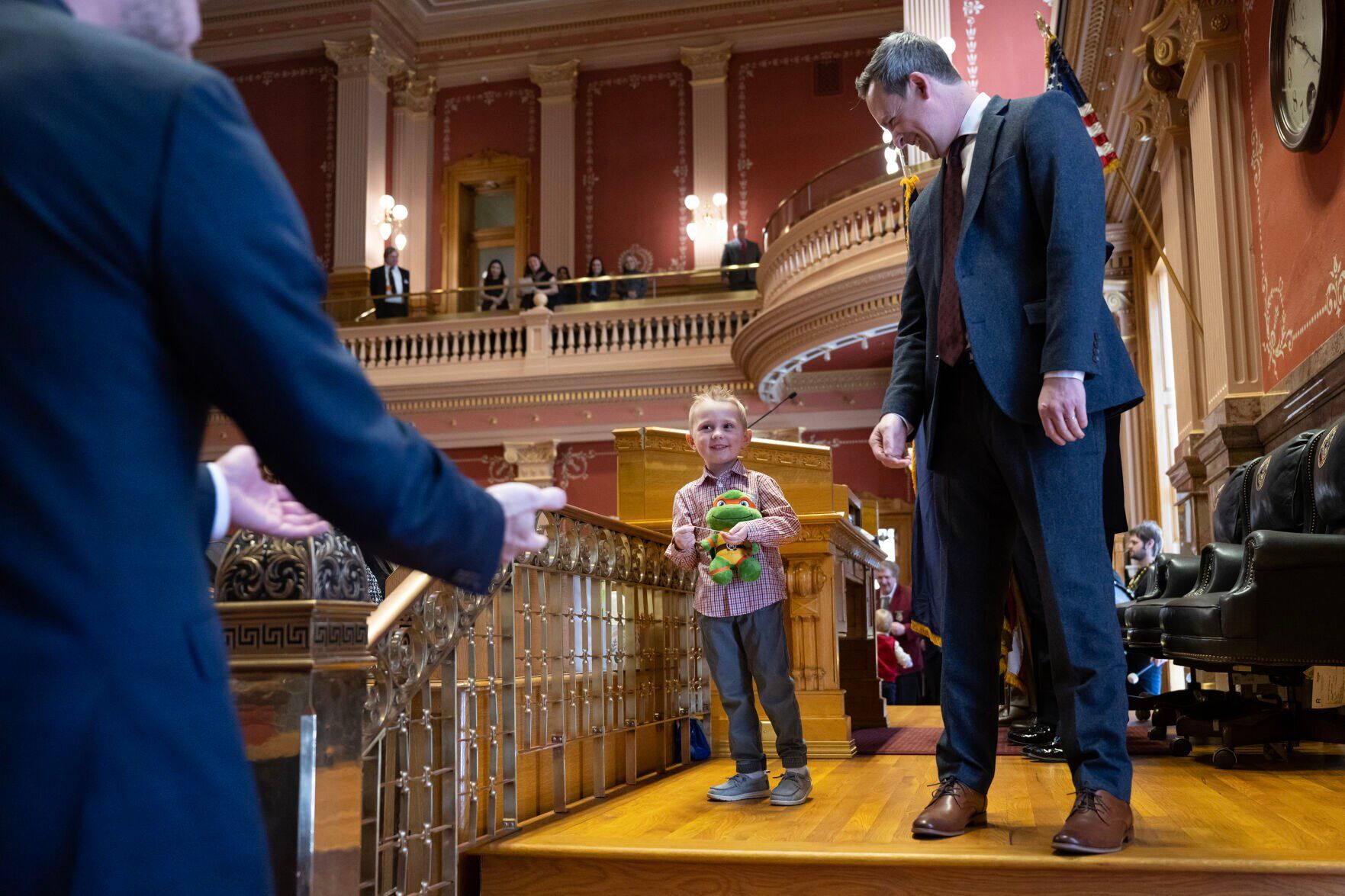 Senate President Steve Fenberg, right, laughs while Sen. Kevin Van Winkle, left, beckons his son Jack, 4, back from behind the podium after he and other children lead the ledge of Allegiance during the first day of Colorado's 2024 legislative session at the Colorado State Capitol building on Wednesday, Jan. 10, 2024, in Denver, Colo.(Timothy Hurst/Denver Gazette) (TimHursttim.hurst@gazette.comhttps://secure.gravatar.com/avatar/aca82bd62b4ee425c598527cd6faa1b1?d=mm&r=g)