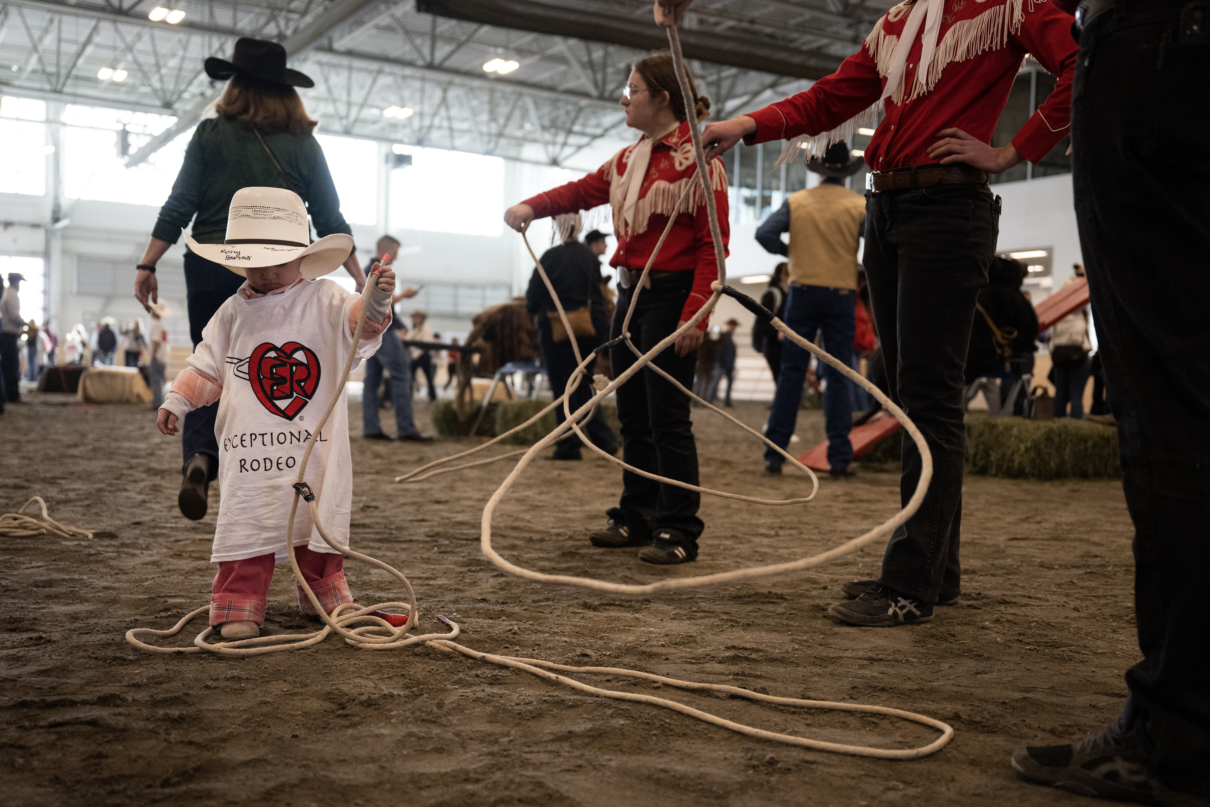 Two-year-old Lou Crow practices spinning a rope with the Westernaires trick and fancy ropers during the annual PRCA Exceptional Rodeo on Thursday, Jan. 18, 2024, at the Temple Grandin Equine Center at Colorado State University Spur in Denver, Colo. (Timothy Hurst/Denver Gazette) (TimHursttim.hurst@gazette.comhttps://secure.gravatar.com/avatar/aca82bd62b4ee425c598527cd6faa1b1?d=mm&r=g)