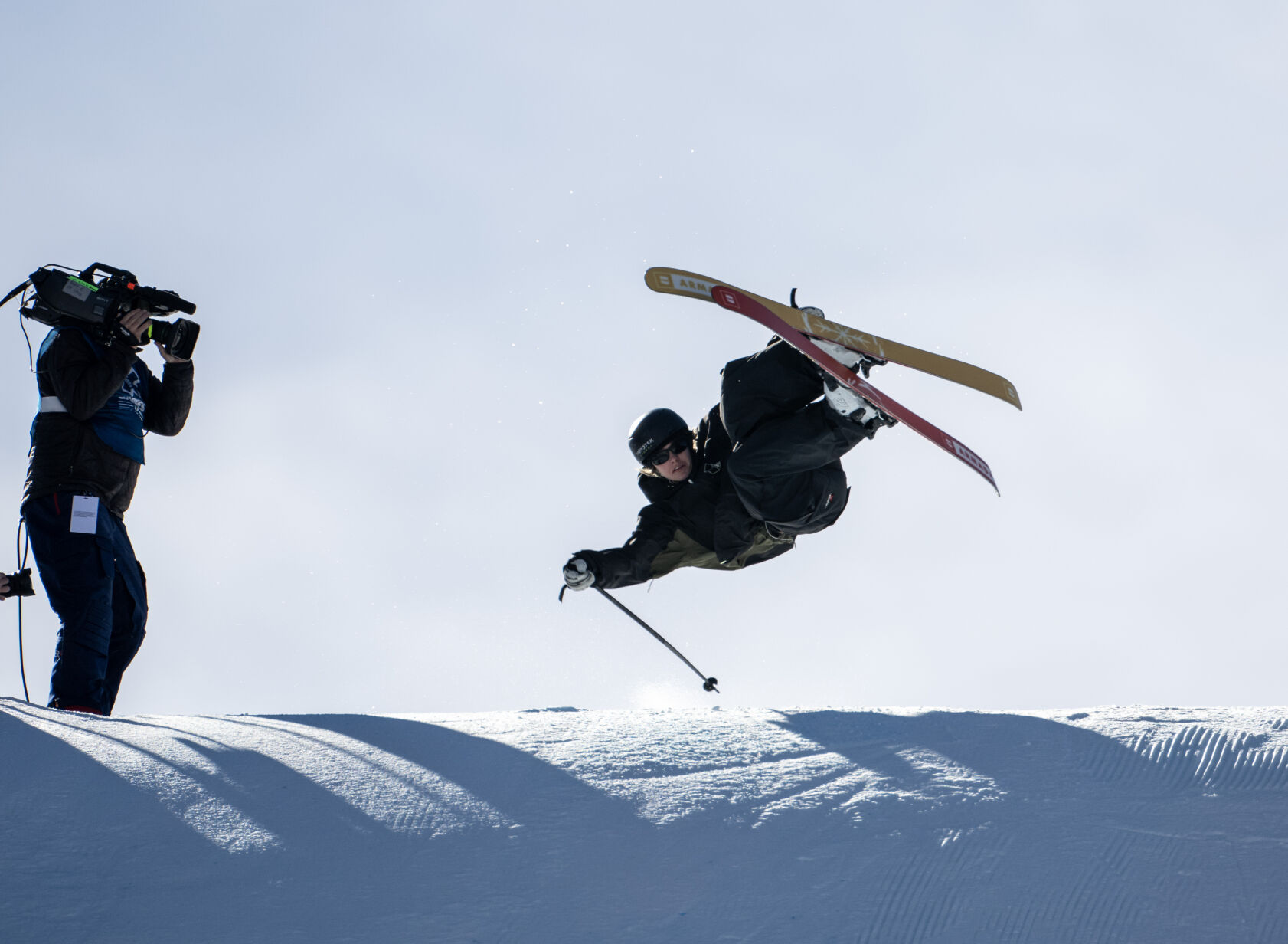 ABOVE: Olivia Asselin of Canada competes in the Thayer Women’s Ski Knuckle Huck Finals at the X Games on Saturday in Aspen. Asselin won gold in the competition.AT RIGHT: Eileen Gu of the U.S. competes in the Chipotle Women’s Ski SuperPipe Finals at the X Games on Saturday. Gu won gold. (Photos by Parker Seibold, The Gazette)