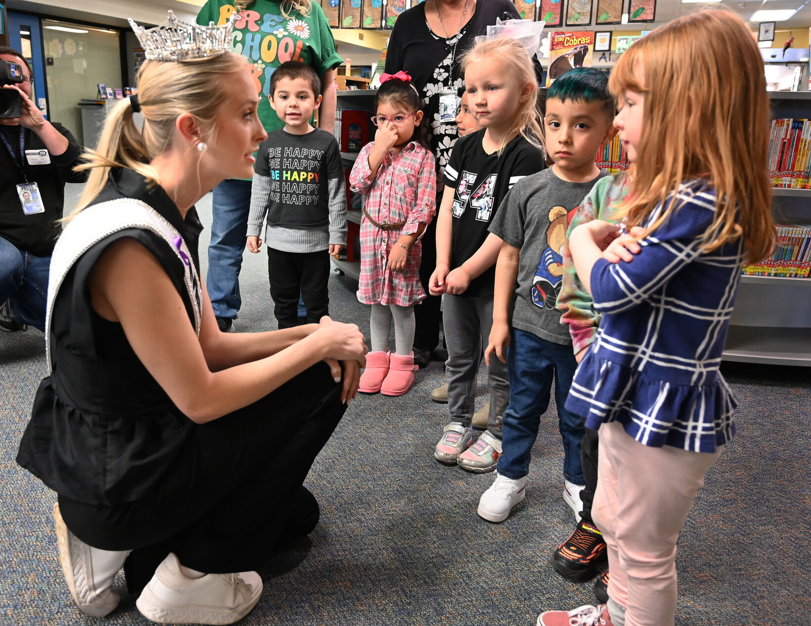 Miss America Madison Marsh visits with kids in the library at Jackson Elementary School on Wednesday, Jan. 24, 2024. (Photo by Jerilee Bennett, The Gazette)