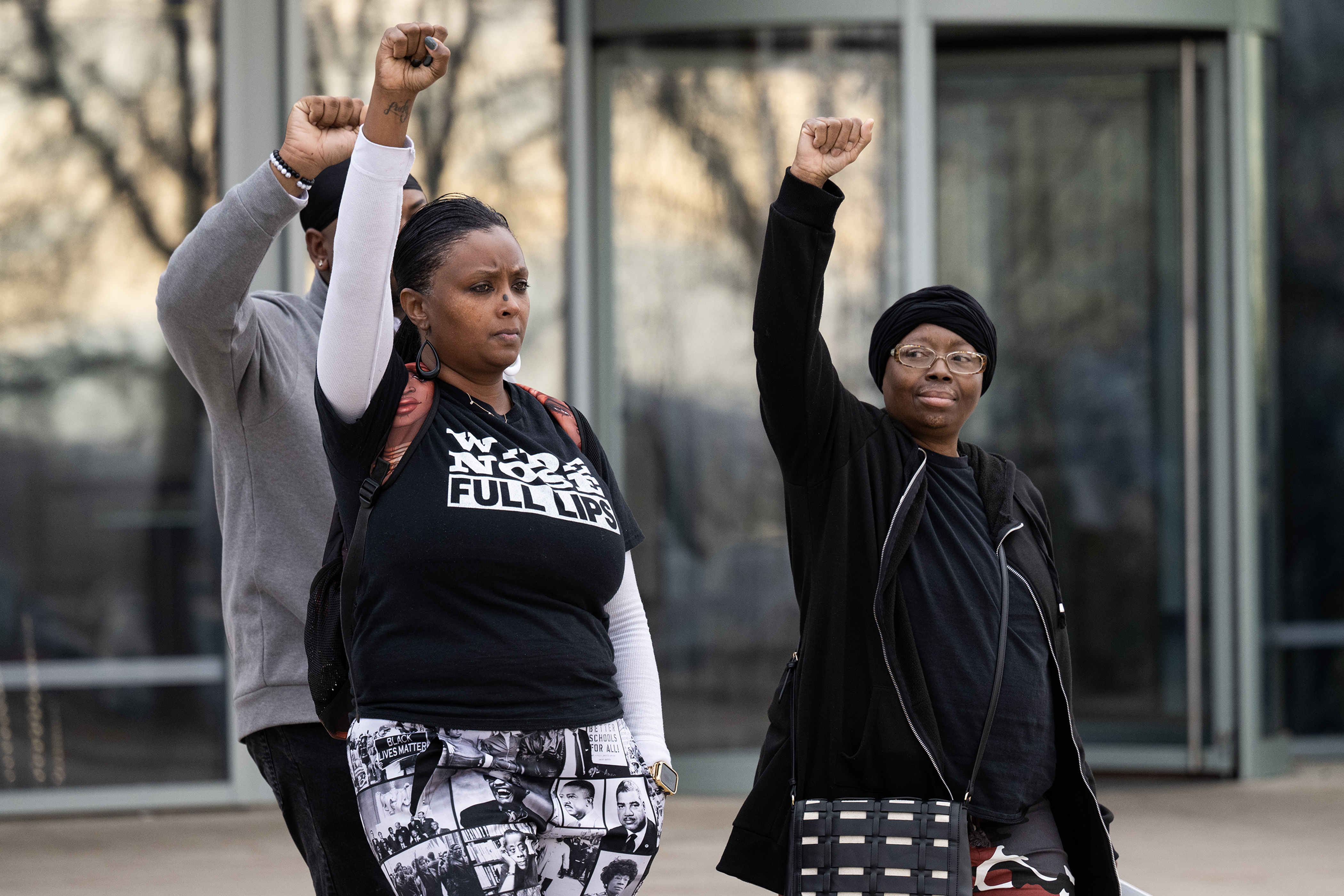 Sheneen McClain, right, the mother of Elijah McClain, walks out of the courthouse with her fist raised along with MiDian Holmes, center, and Auon'tai Anderson, following the sentencing of former Aurora police Officer Randy Roedema for his role in the 2019 killing of McClain’s son, on Friday, Jan. 5, 2024, at the Adams County Court in in Brighton, Colo. (Timothy Hurst/Denver Gazette) (TimHursttim.hurst@gazette.comhttps://secure.gravatar.com/avatar/aca82bd62b4ee425c598527cd6faa1b1?d=mm&r=g)