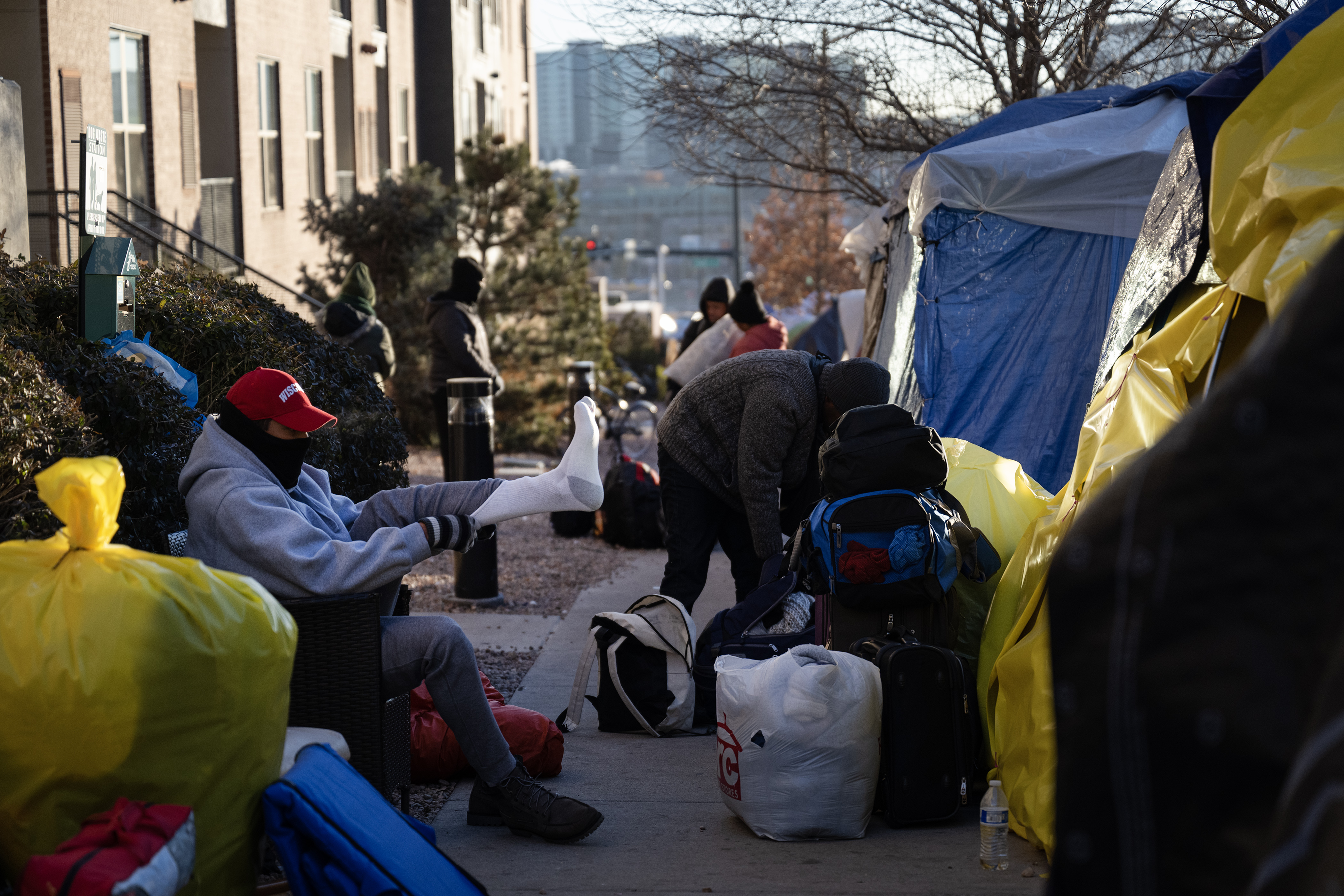 FILE PHOTO: Immigrants begin packing up their belongings during an encampment sweep at West 27th Avenue, between Zuni and Alcott Streets on Wednesday, Jan. 3, 2024, in Denver, Colo. (Timothy Hurst/Denver Gazette) (TimHursttim.hurst@gazette.comhttps://secure.gravatar.com/avatar/aca82bd62b4ee425c598527cd6faa1b1?d=mm&r=g)